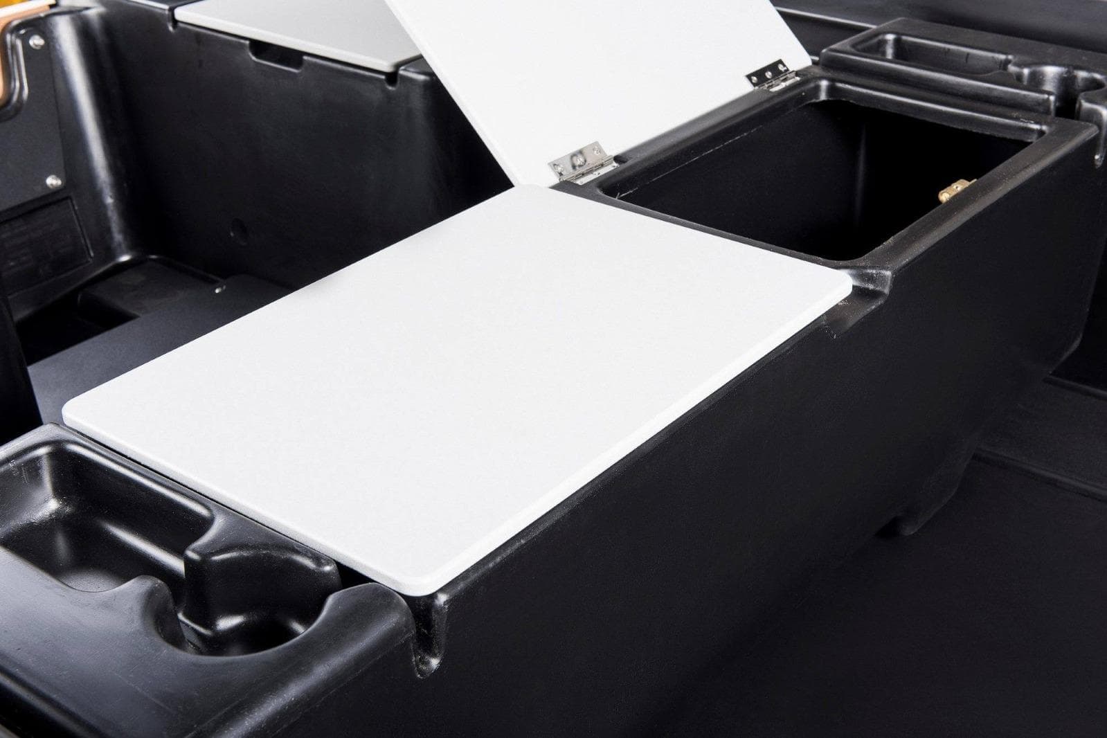 2026 Rigiflex Black Bass 370 boat storage compartment with open lid.