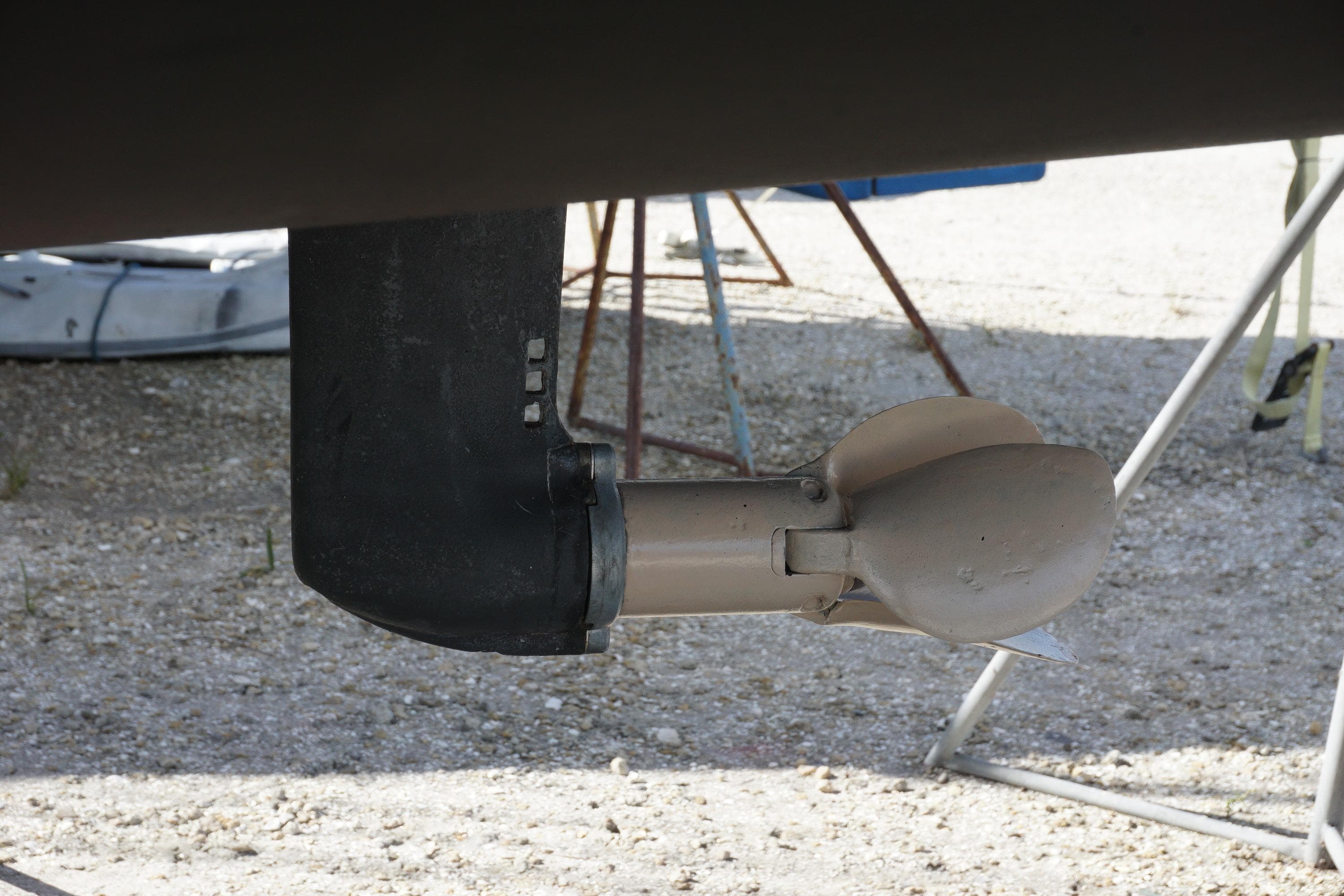 Close-up of a 2012 Beneteau Oceanis 45 sailboat propeller and rudder.