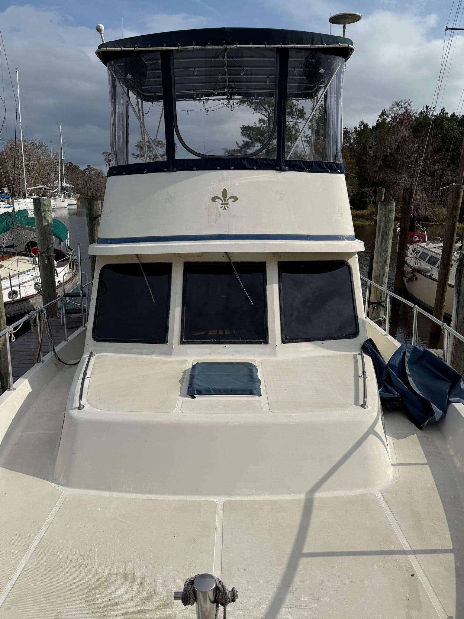 1988 PT 42 Yacht docked, front view.