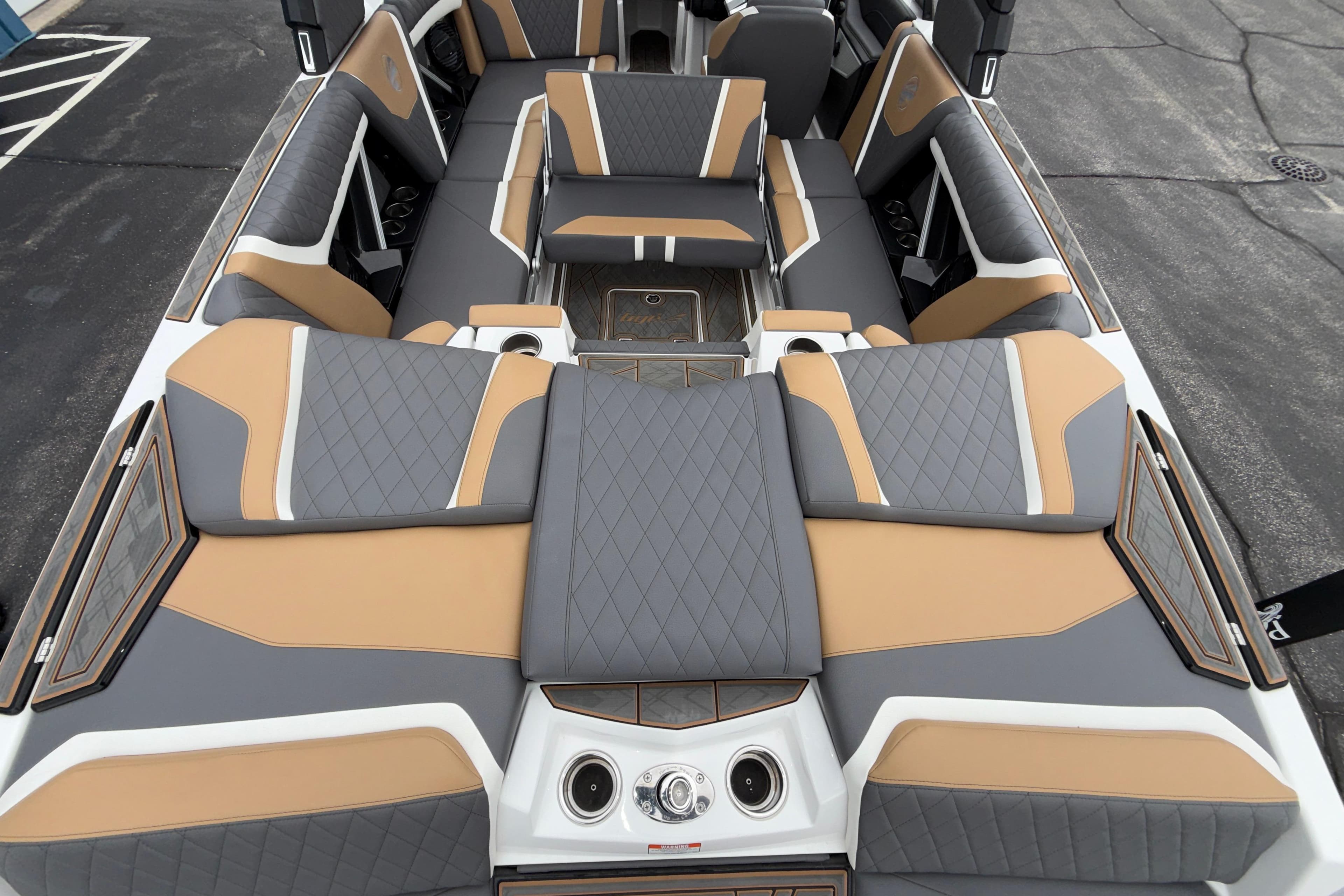 2023 Tigé 23ZX boat interior with luxurious gray and tan seating design.