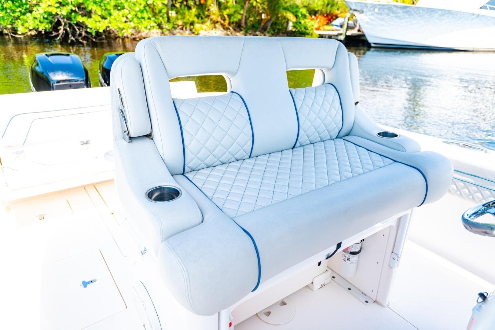 Luxurious seating on a 2018 Intrepid 327 Center Console boat, featuring quilted upholstery.