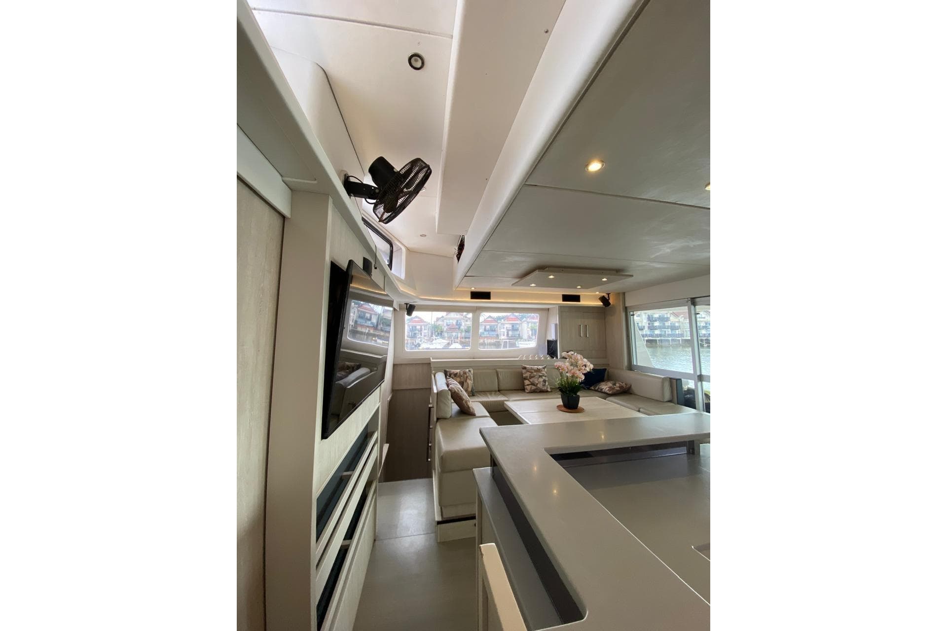 Luxurious interior of 2018 Leopard 58 yacht with modern seating and decor.