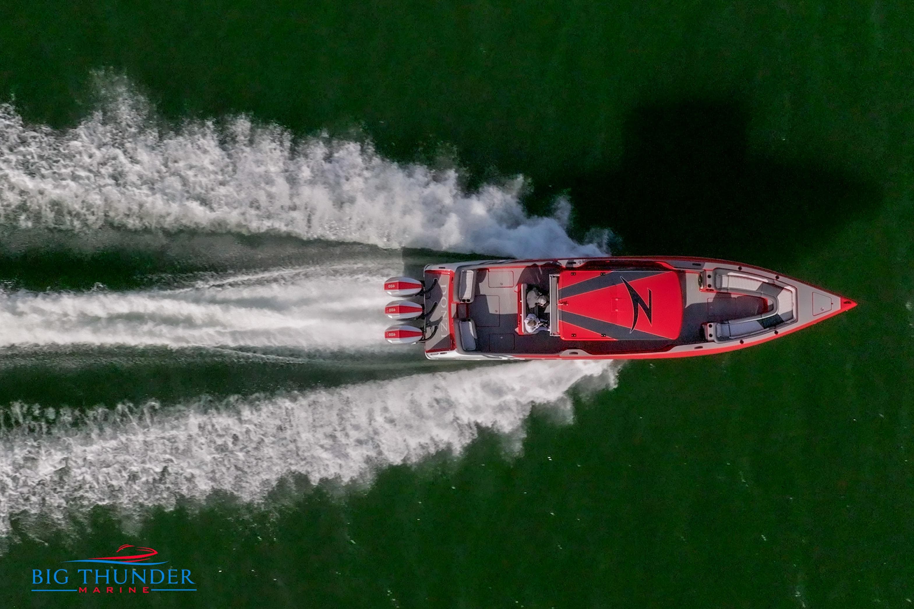 Aerial view of 2024 Donzi 39 VRZ speedboat on water.