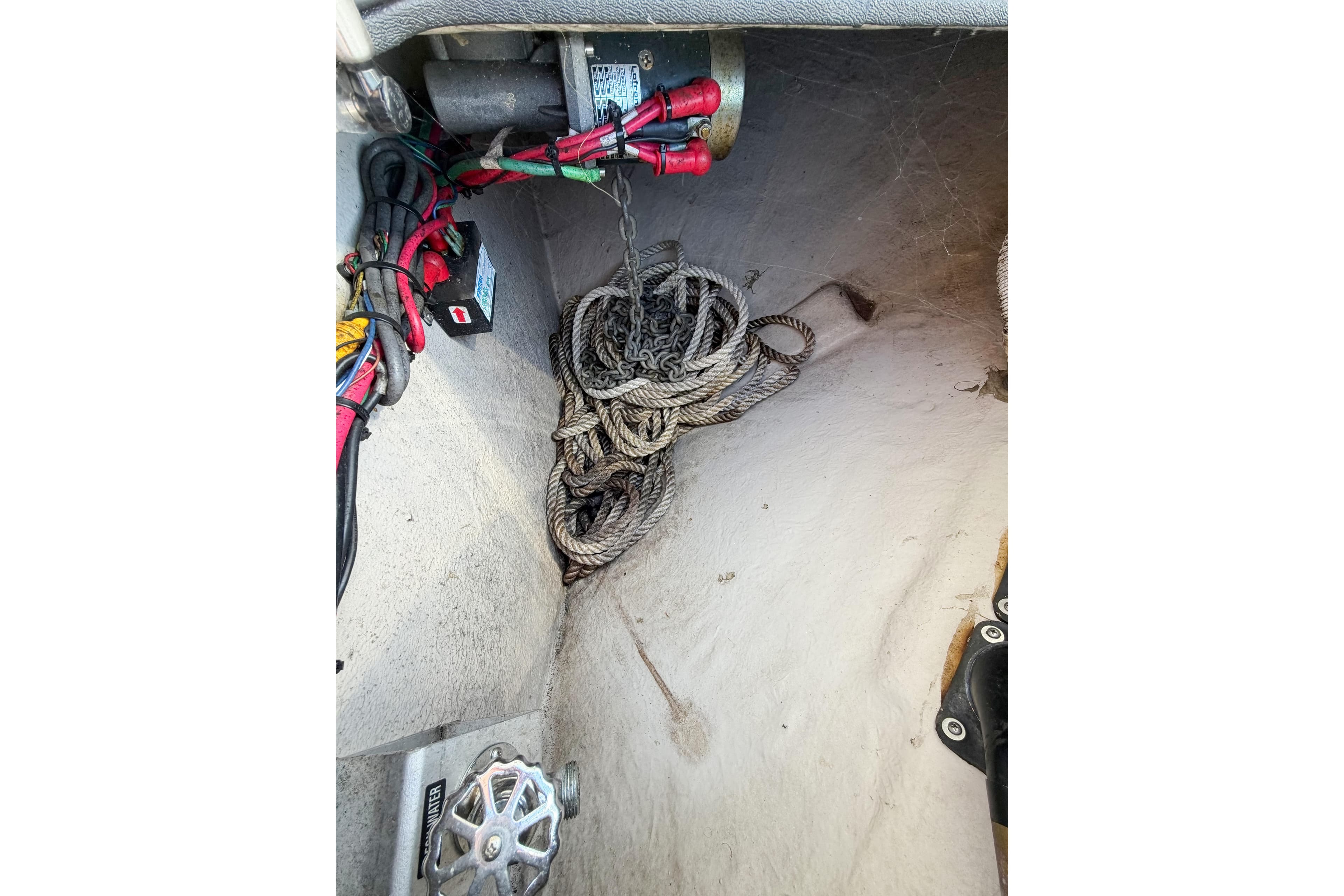 Interior view of a 2005 Sea Ray 40 Sundancer boat showing ropes and wiring.