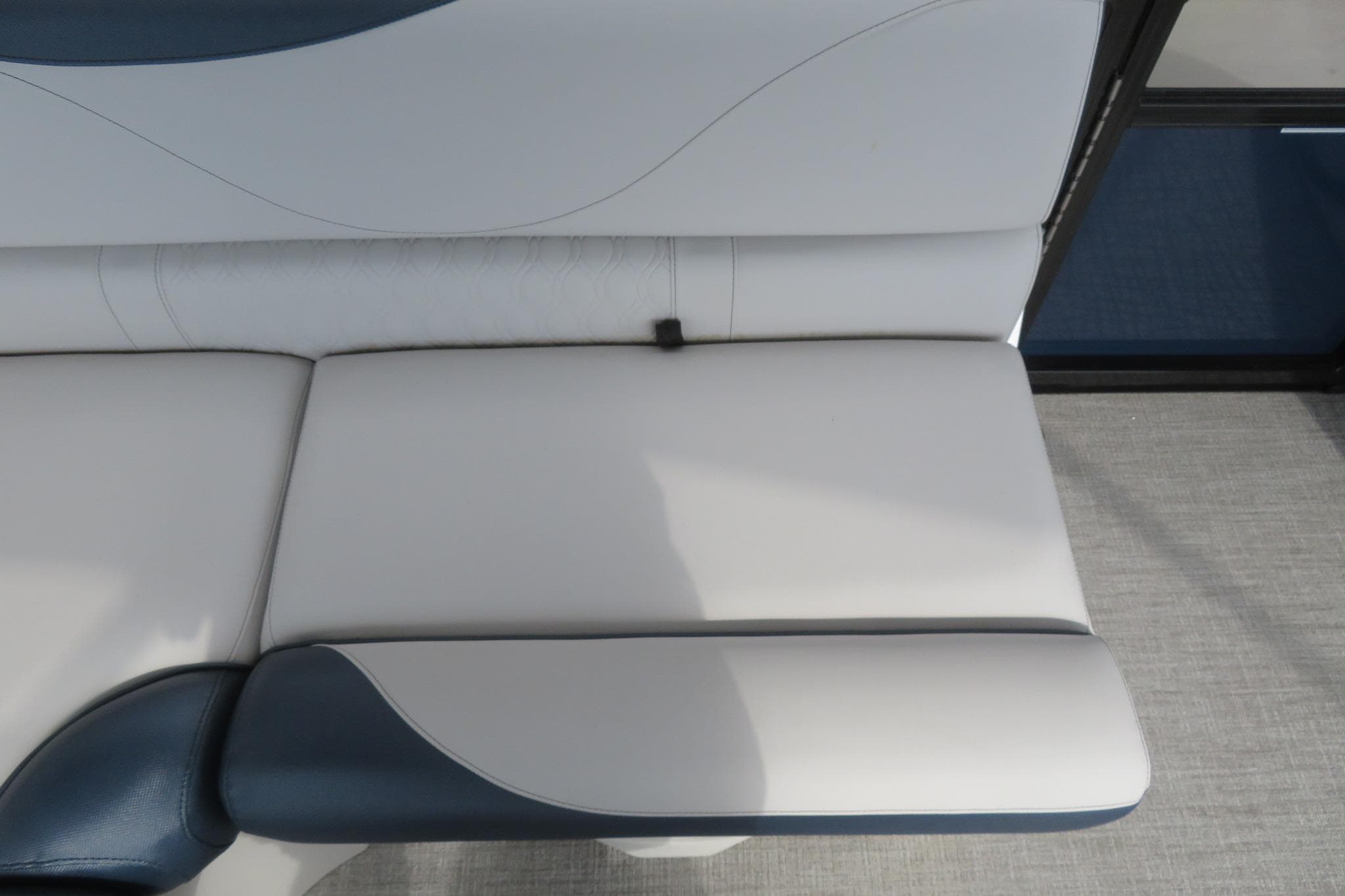 2026 Avalon Venture 85 boat seat with white upholstery.