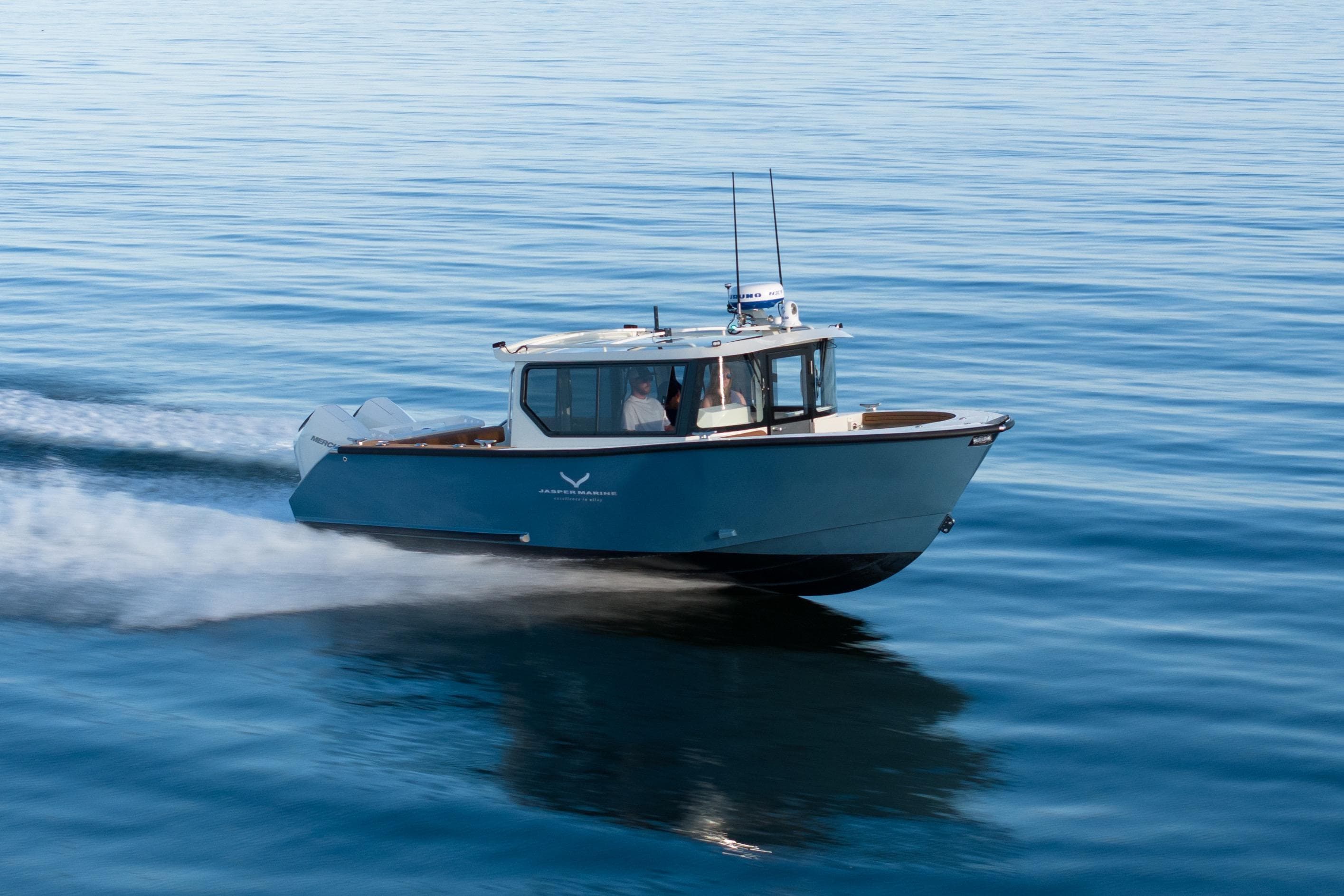 2026 Jasper Marine Defender 22 cruising on calm blue waters.