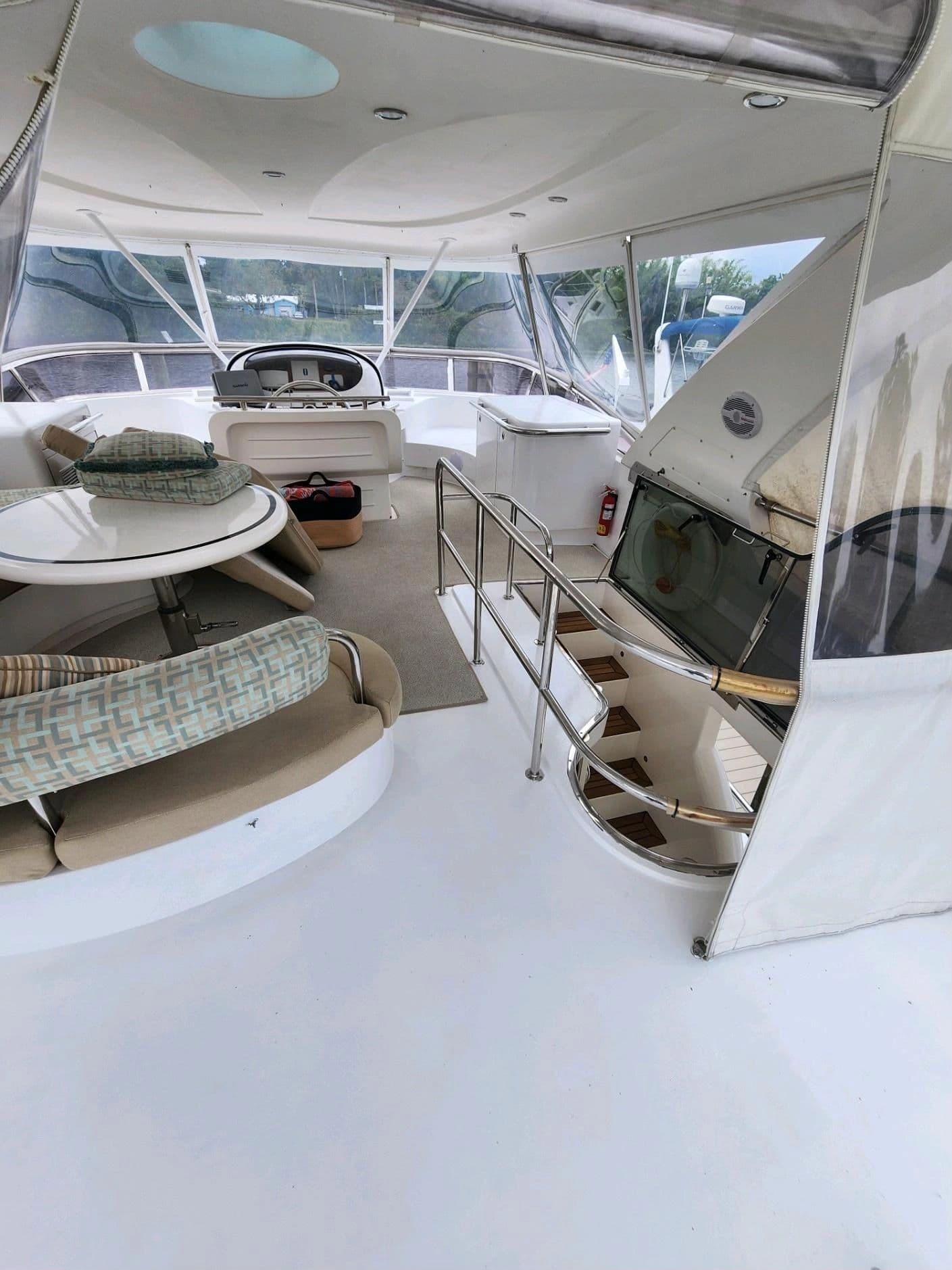 Interior of a 2003 Horizon 64 yacht with seating area.