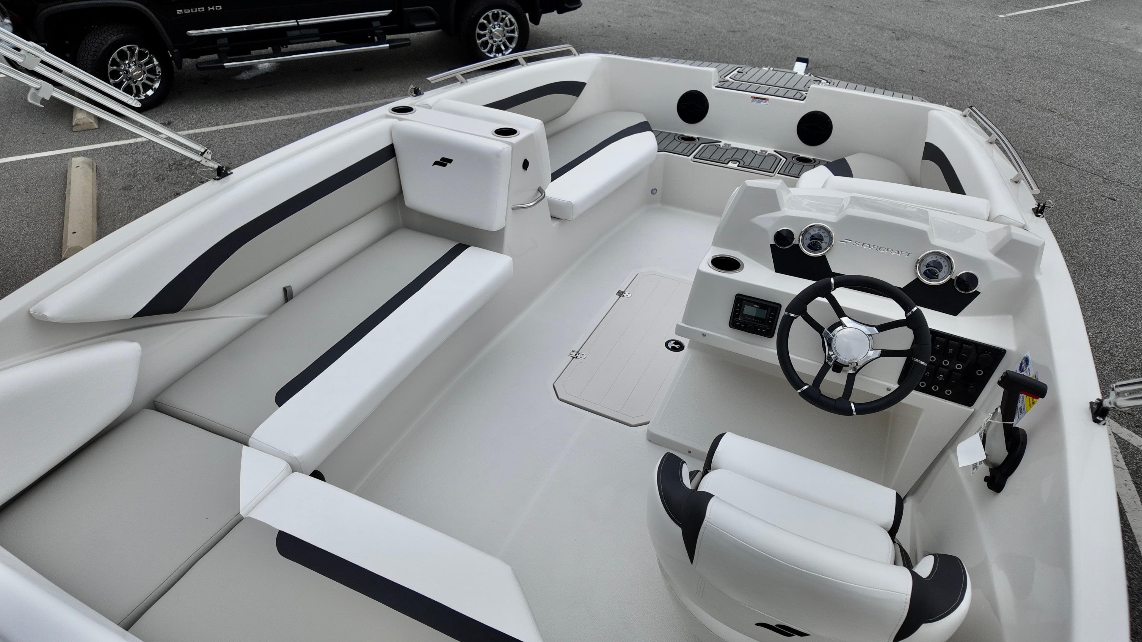 2025 Starcraft SVX 171 OB boat interior with sleek seating and modern dashboard.