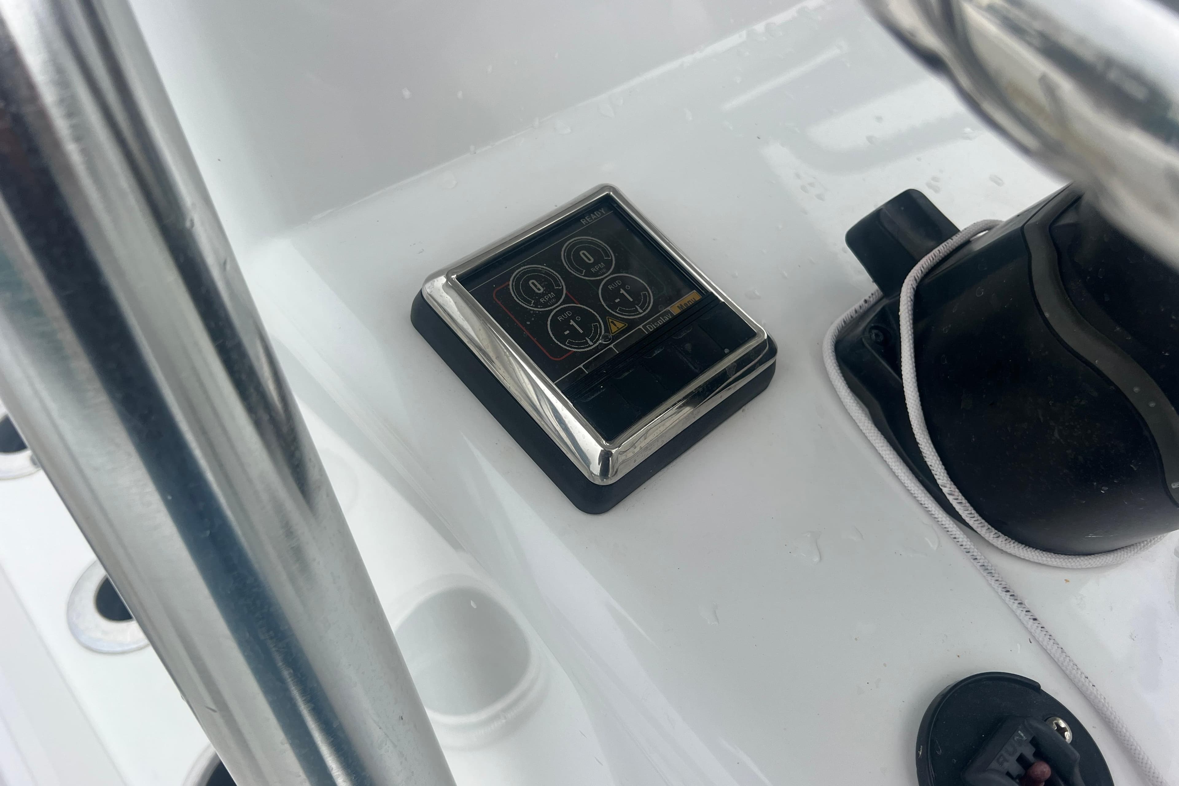 Control panel on 2022 Sea-Lion 34 TE boat dashboard with chrome accents.