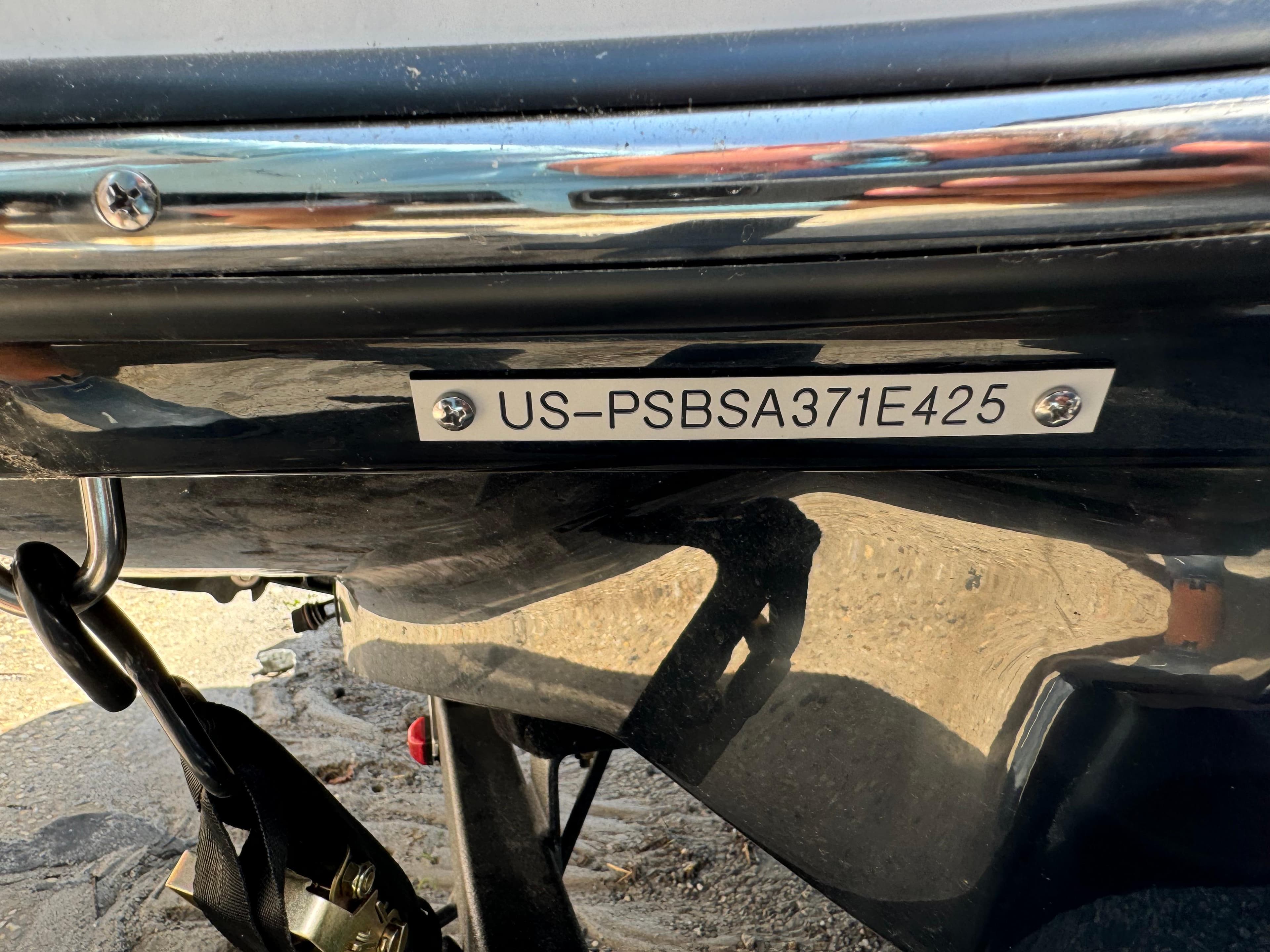 2025 Scarab 165 ID boat hull identification number plate.
