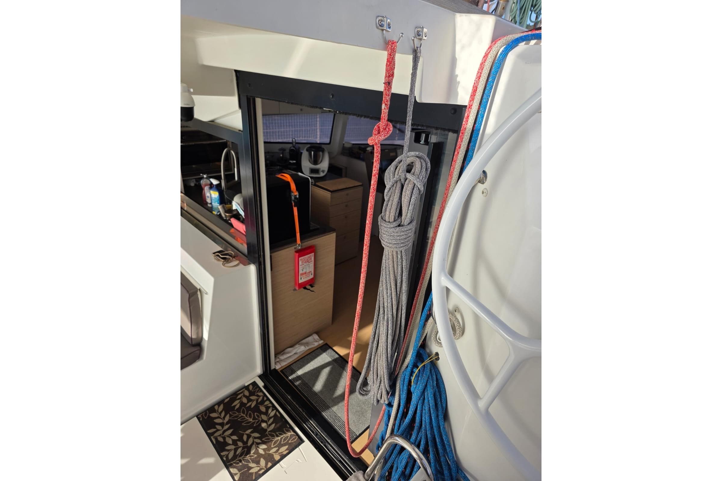 Interior view of a 2016 Bali 4.5 catamaran with ropes and equipment.