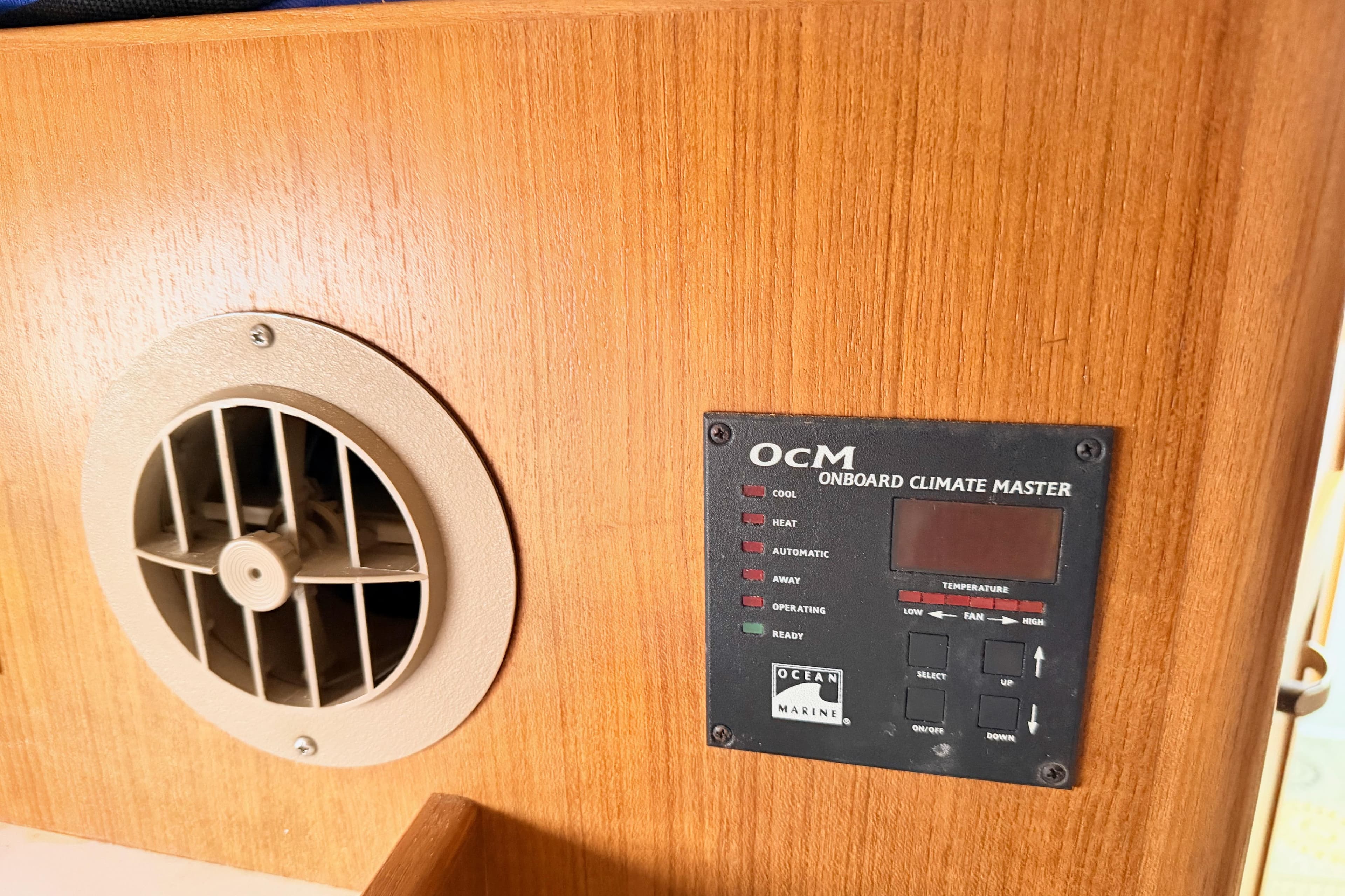 Onboard climate control panel in 2001 Catalina 380 yacht interior.