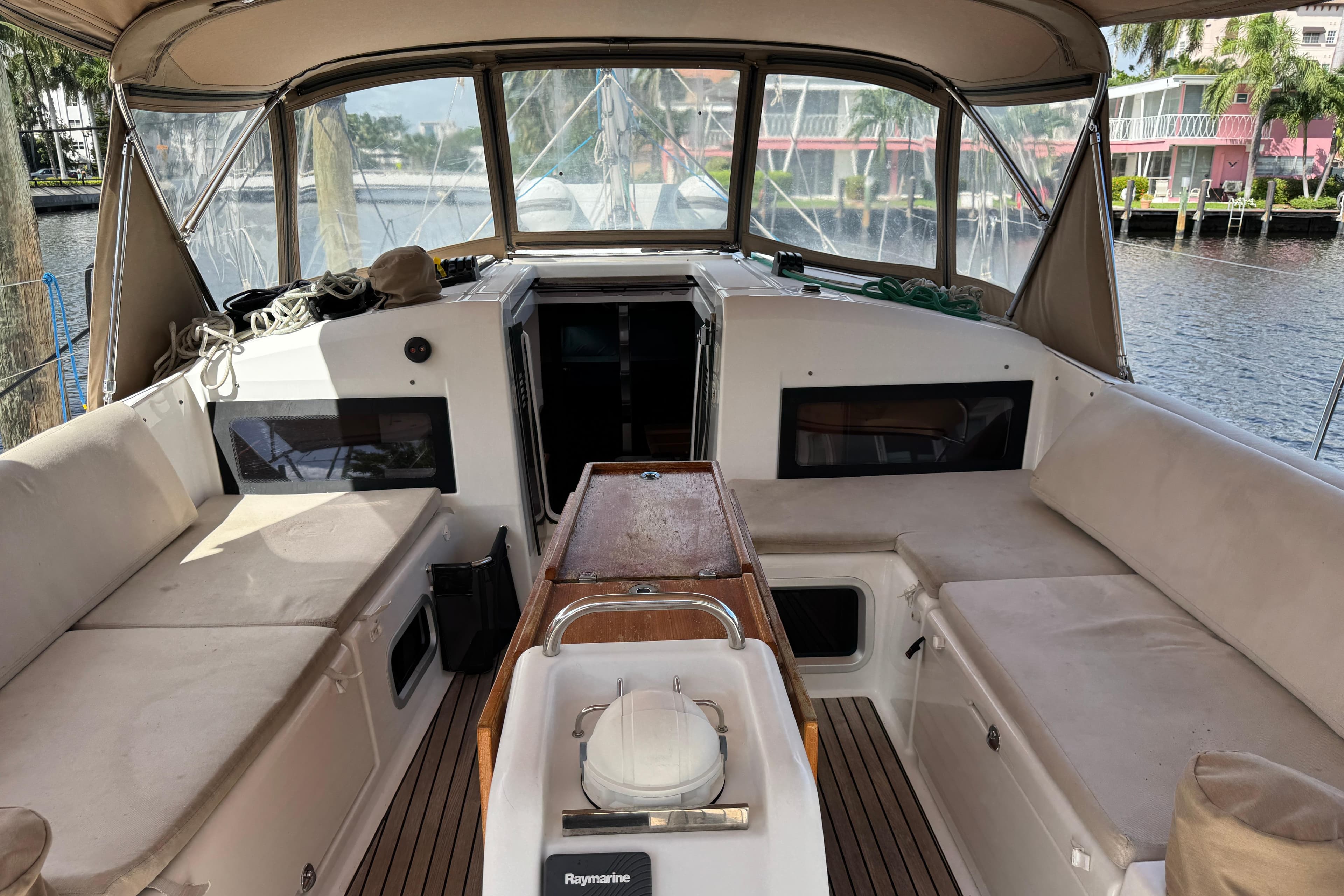 Interior view of 2018 Jeanneau Sun Odyssey 440 sailboat with seating and navigation equipment.