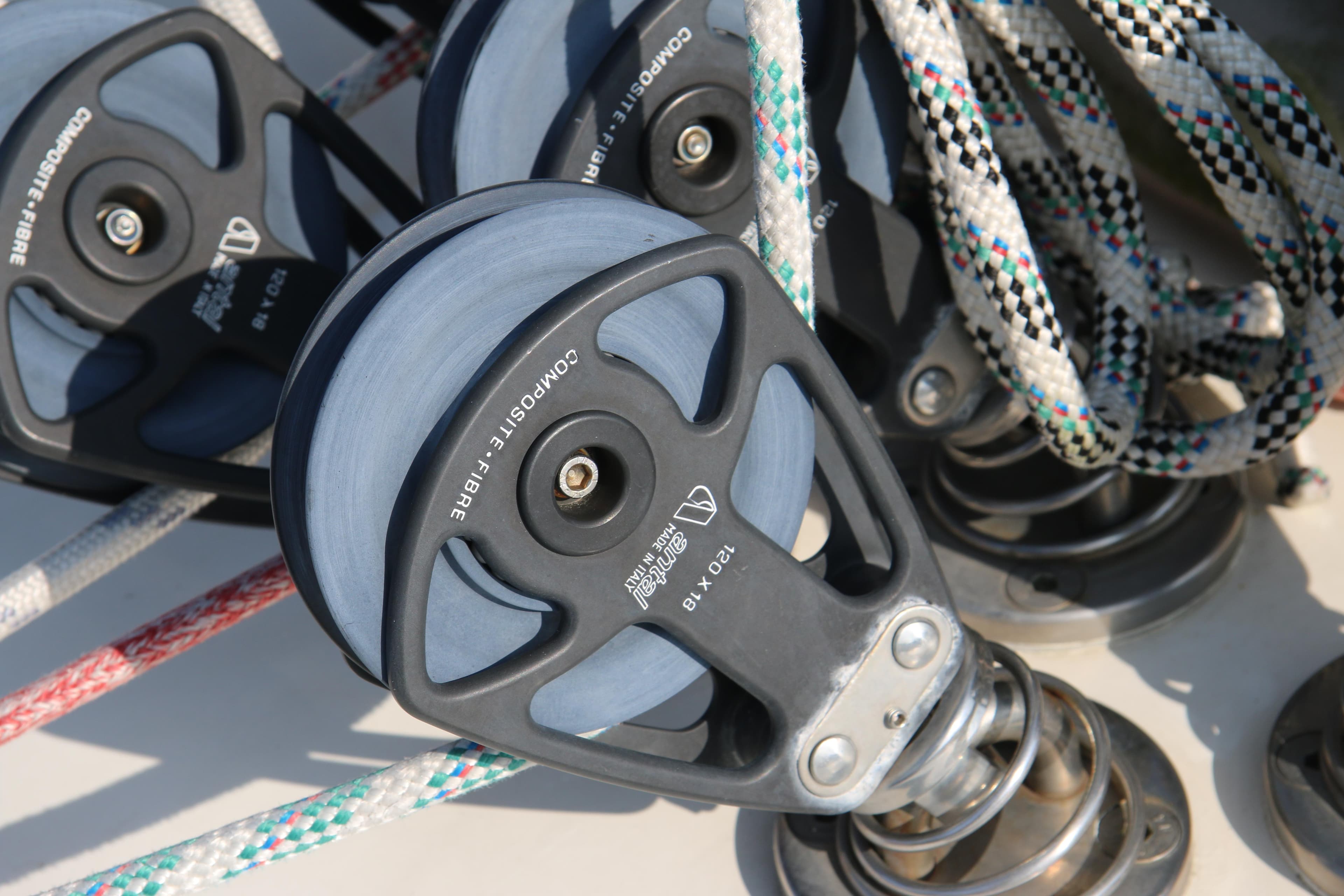 Pulley system on 2008 Blue Water Explorer Adventure Ketch with colorful ropes.