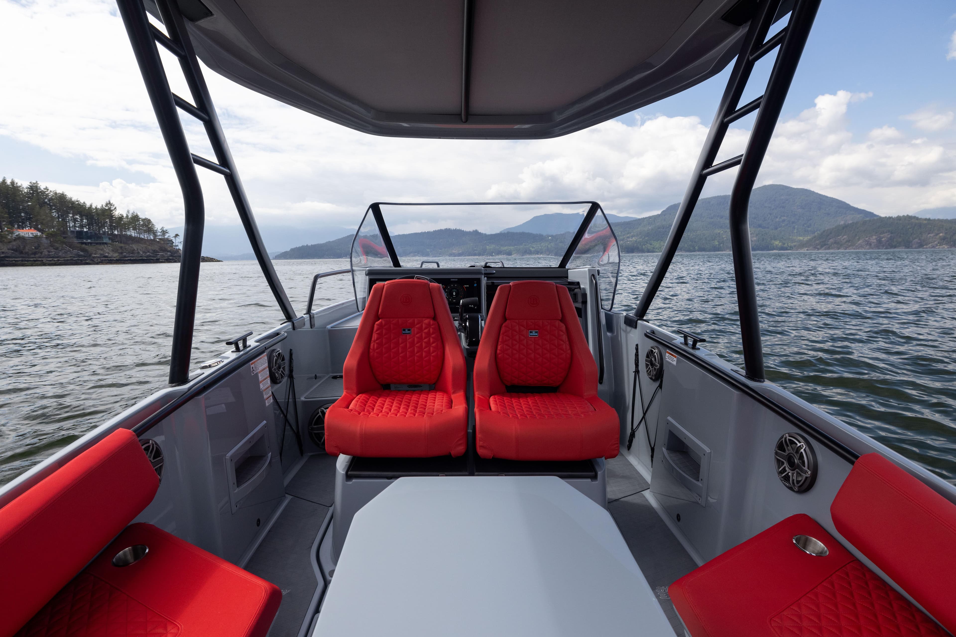 BRABUS Shadow 300 Cross Top Edition One 2026 with red seats on water.