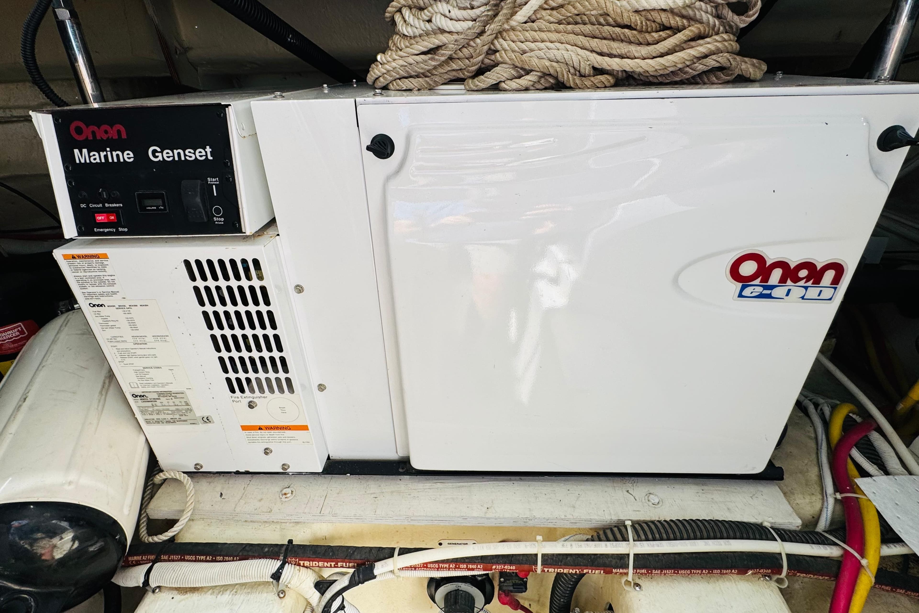 Onan marine generator in a 2006 Carver 46 Voyager yacht engine room.