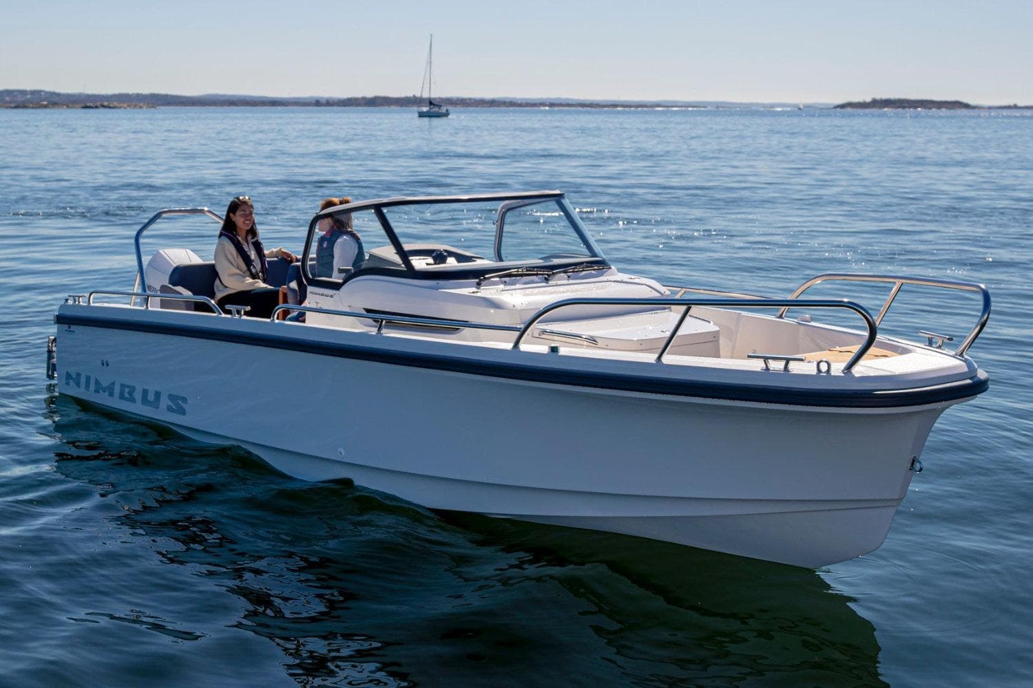 2026 Nimbus Tender 8 (T8) boat cruising on calm waters with passengers onboard.