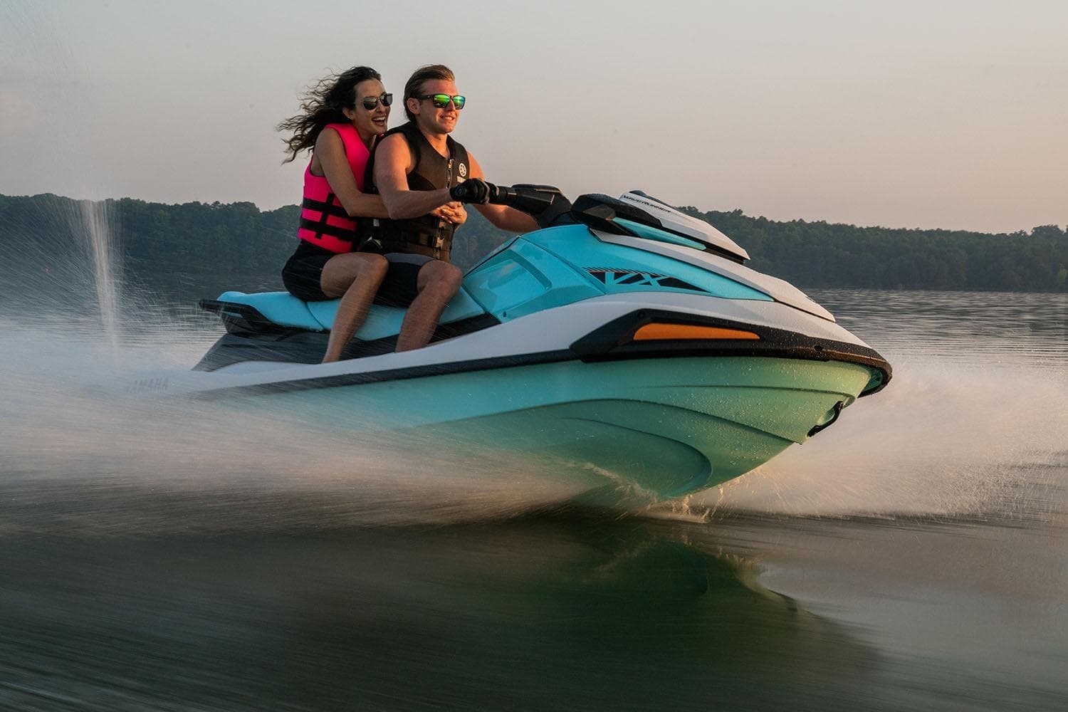 Manufacturer Provided Image: Couple enjoying a ride on a 2026 Yamaha WaveRunner VX jet ski on a lake.