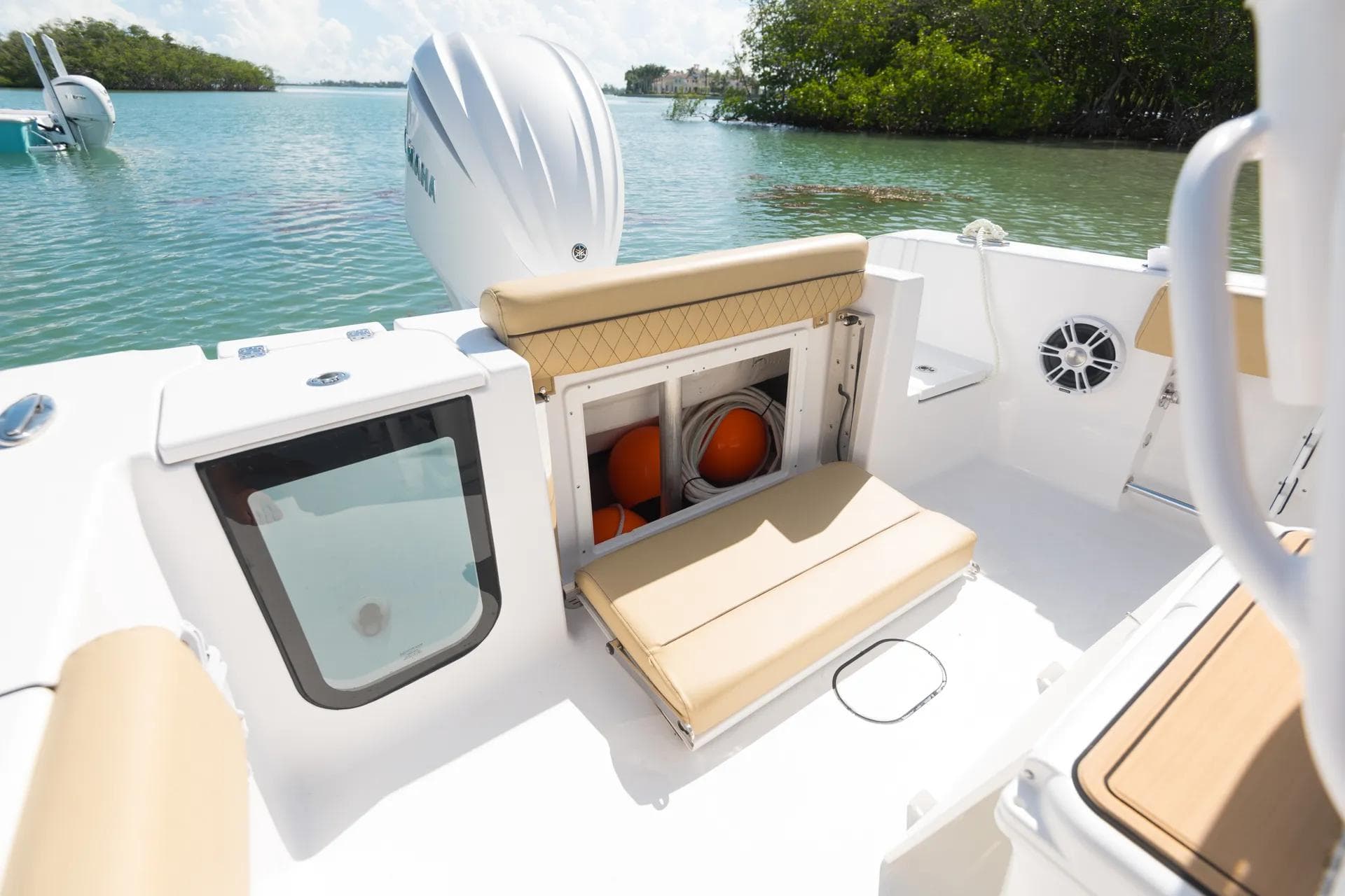 Manufacturer Provided Image: 2025 Sportsman Open 232 Center Console boat interior with seating and storage.
