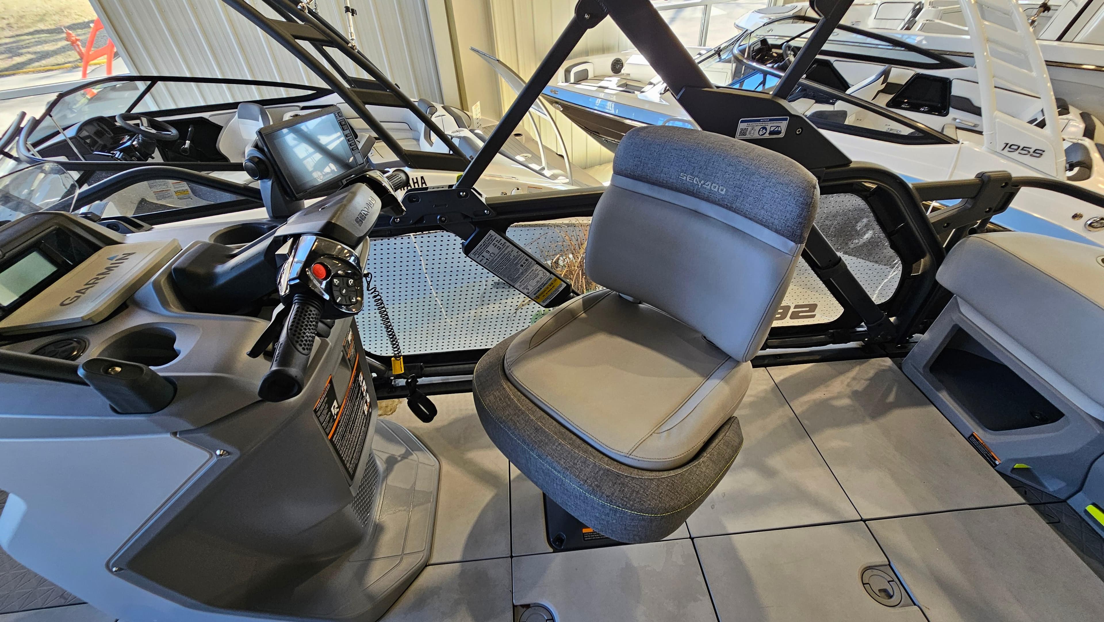2023 Sea-Doo Switch Cruise 21 interior with steering console and seating.