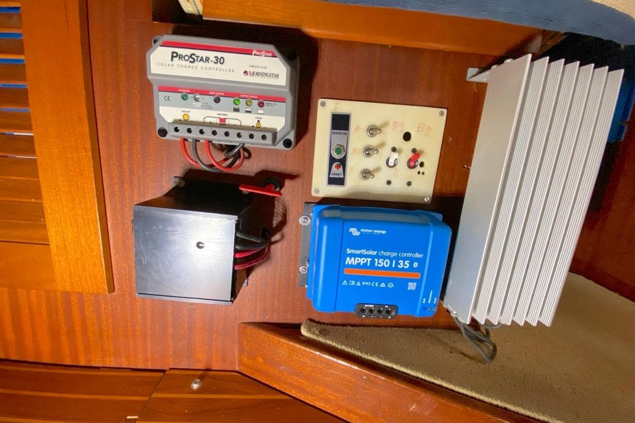 Electrical panel with solar charge controllers on a 1992 Hallberg-Rassy 45 yacht.