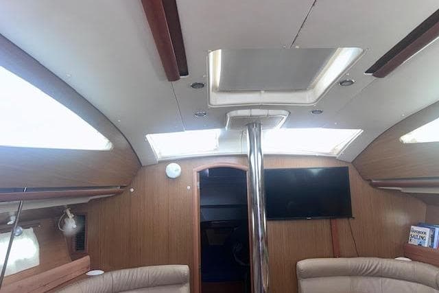Interior of 2007 Jeanneau Sun Odyssey 42 DS sailboat, featuring modern design and comfortable seating.