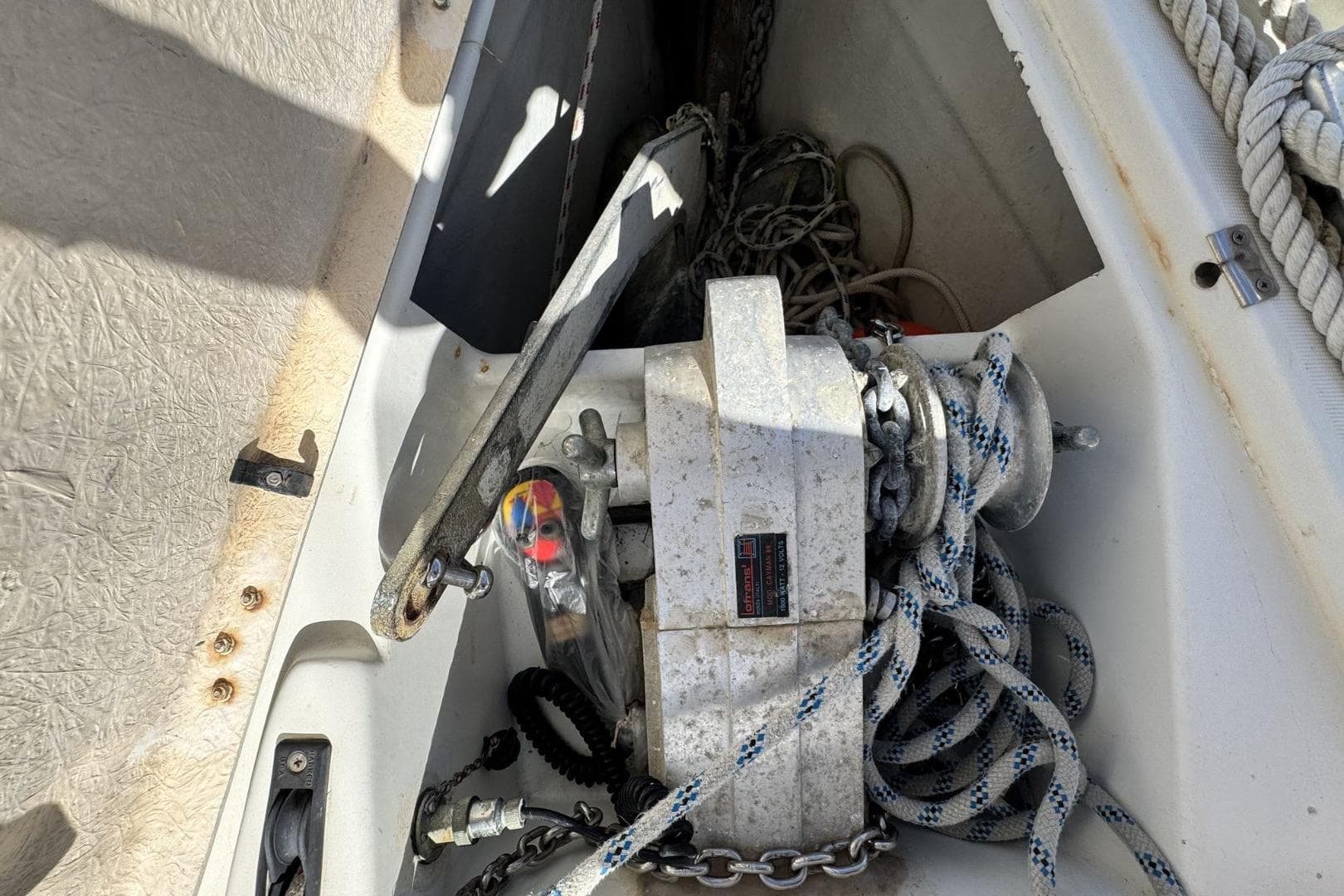 Anchor and winch system on a 1993 Beneteau Oceanis 351 sailboat.