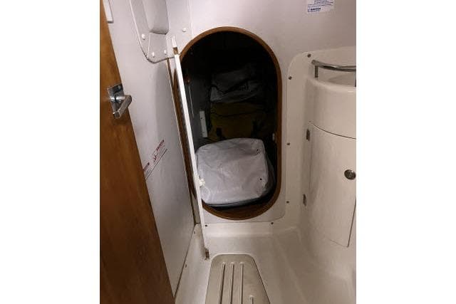 Interior storage compartment on a 2004 J Boats J/133 sailboat.