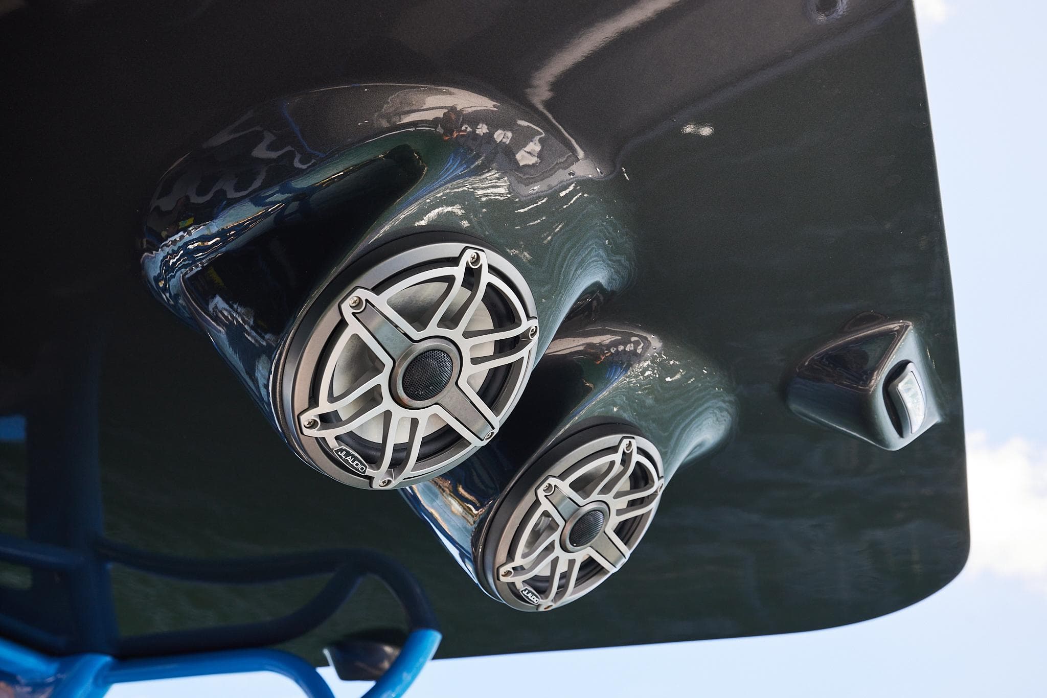 Close-up of 2023 Midnight Express 43' Solstice boat speakers and hull details.