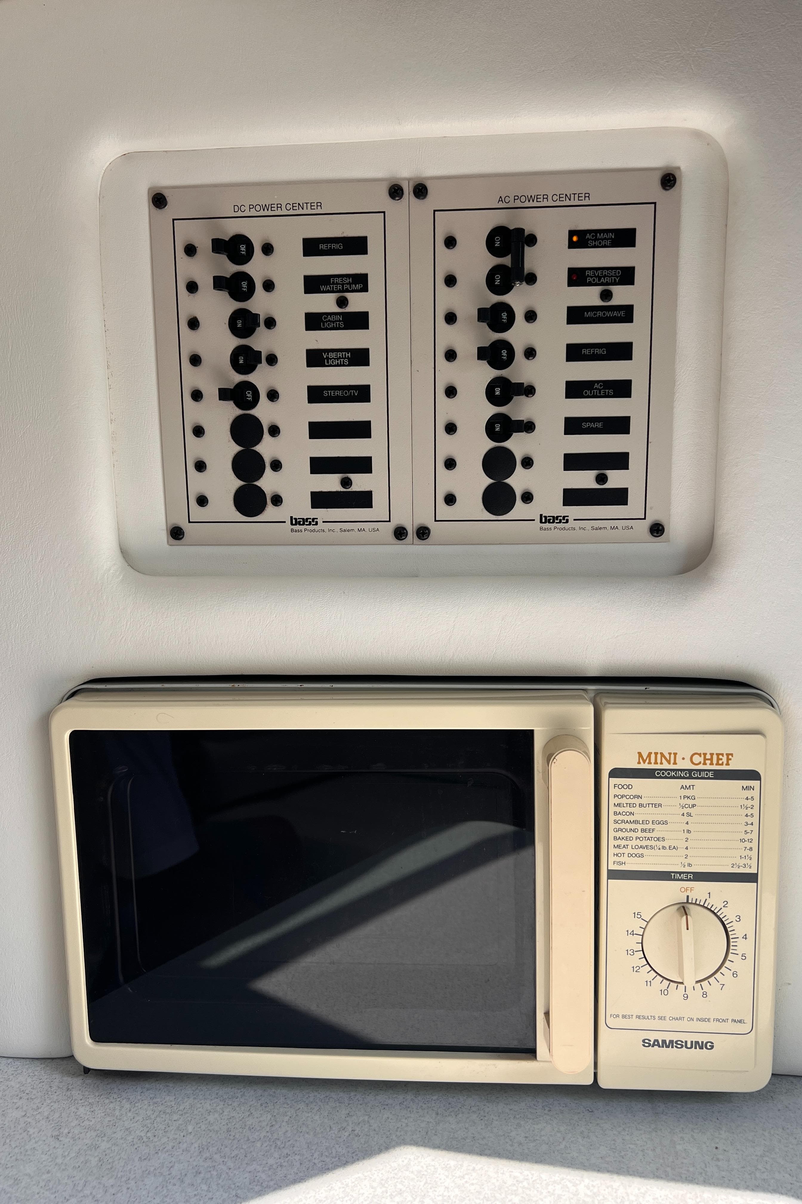 1995 Powerquest 290 Enticer FX control panel and microwave interior view.