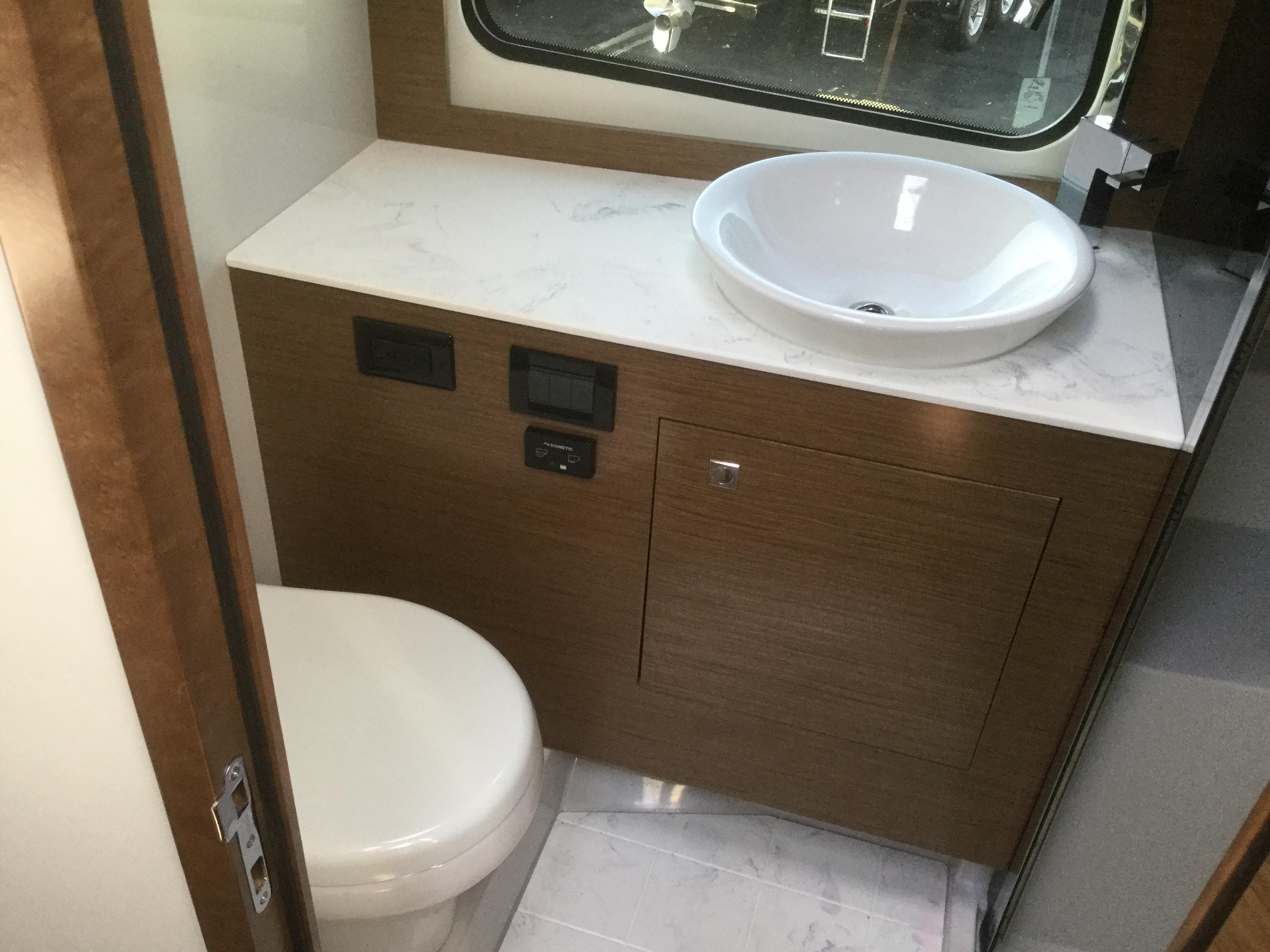 Luxury bathroom in 2020 Cruisers Yachts 390 Express Coupe.