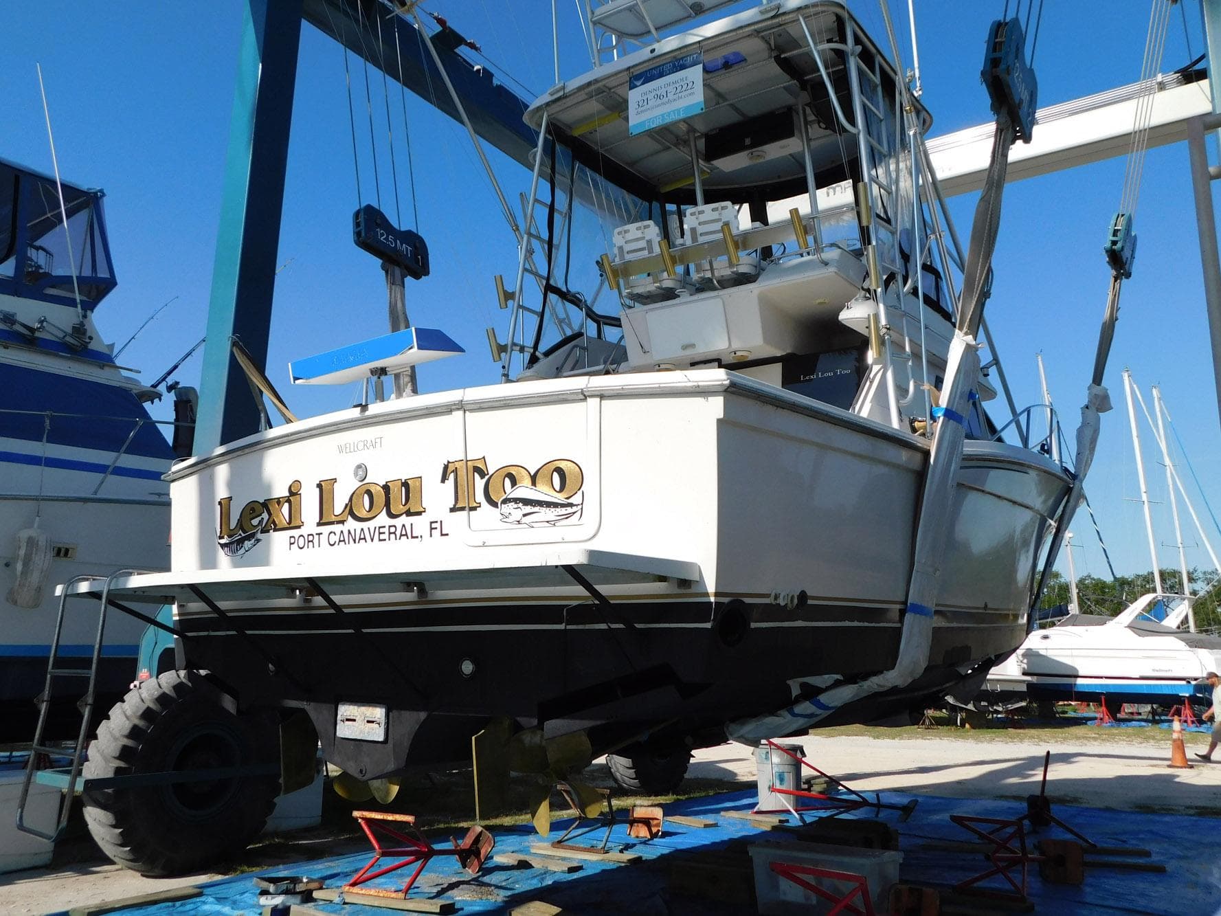 1991 Wellcraft Sport Bridge 3300 boat in dry dock at Port Canaveral, Florida.