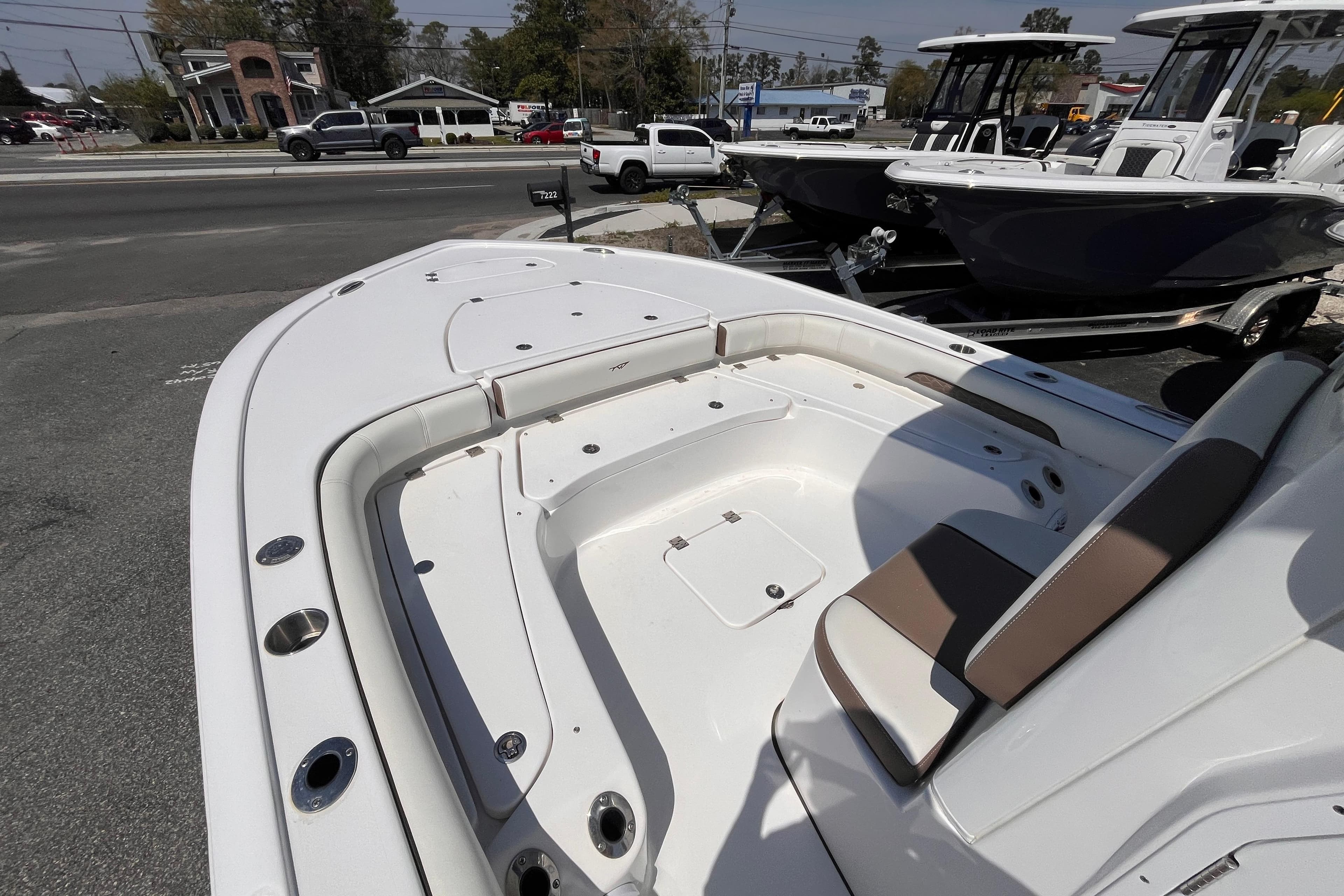 2025 Tidewater 2500 Carolina Bay boat interior with seating and storage compartments.