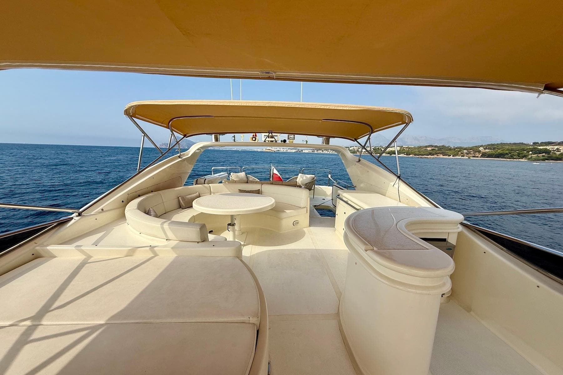 Luxurious 2003 Astondoa 82' GLX yacht with spacious deck and ocean view.