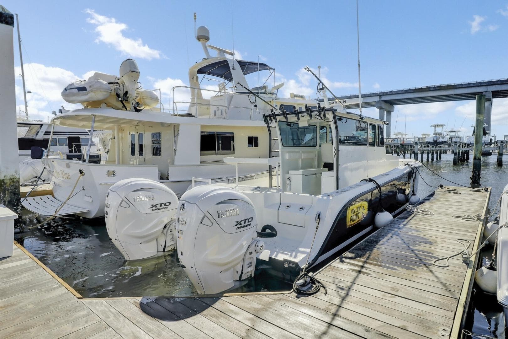 Docked 2024 Custom Nerowalker 35 boat with twin Yamaha XTO engines.