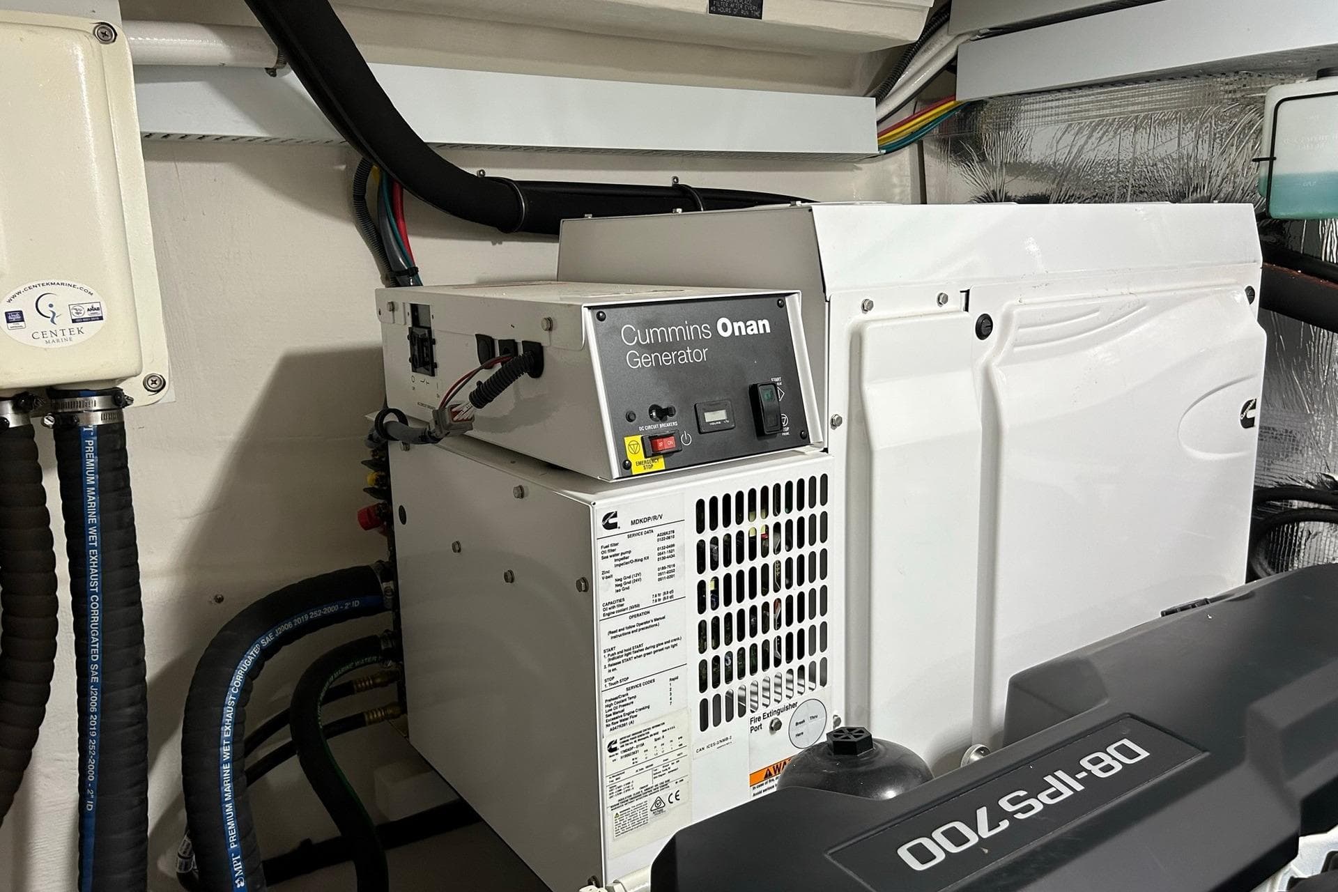 Cummins Onan generator in 2021 Cruisers Yachts 50 Cantius engine room.