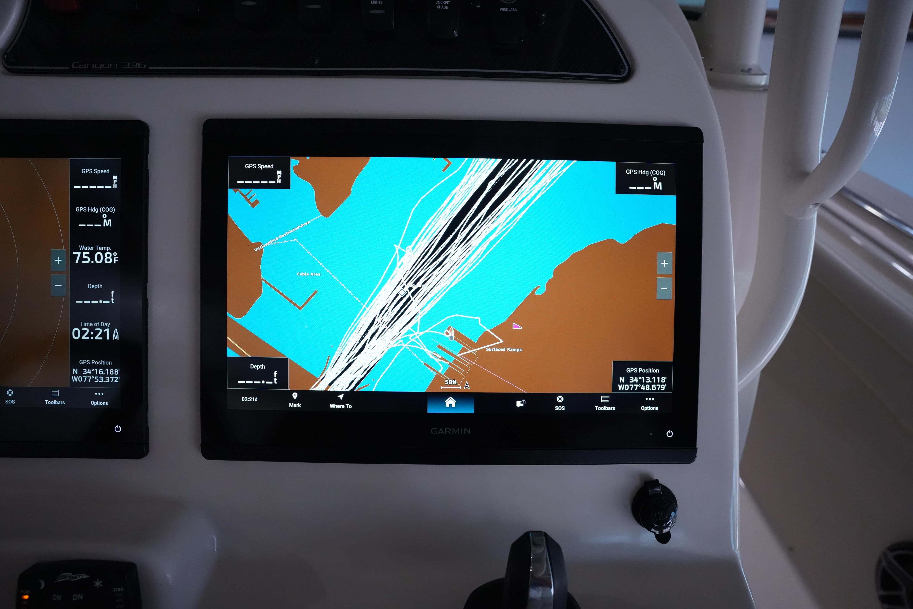 2023 Grady-White Canyon 336 boat dashboard with Garmin navigation display.