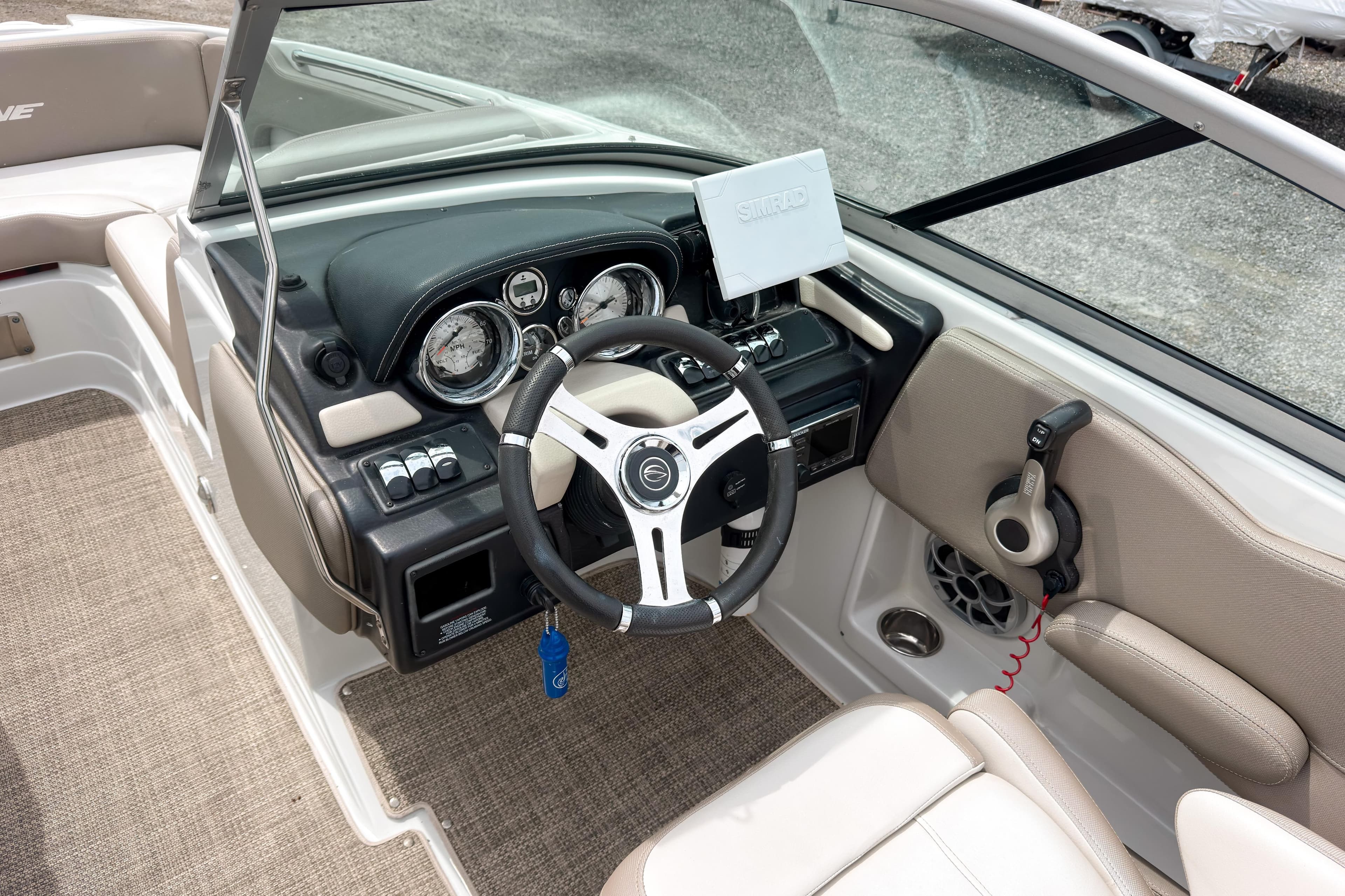 2018 Crownline Eclipse E215 XS boat dashboard with steering wheel and controls.