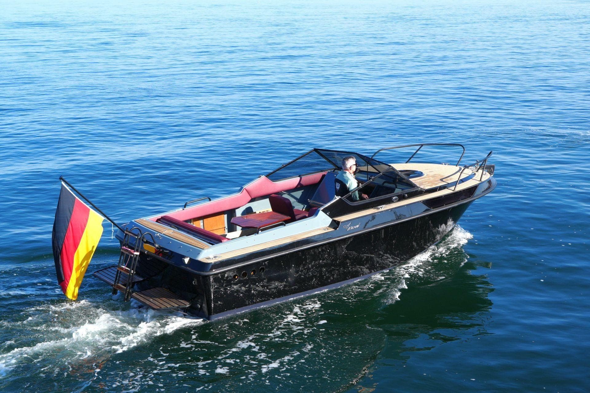 1978 Coronet 22 DC motorboat on calm water.
