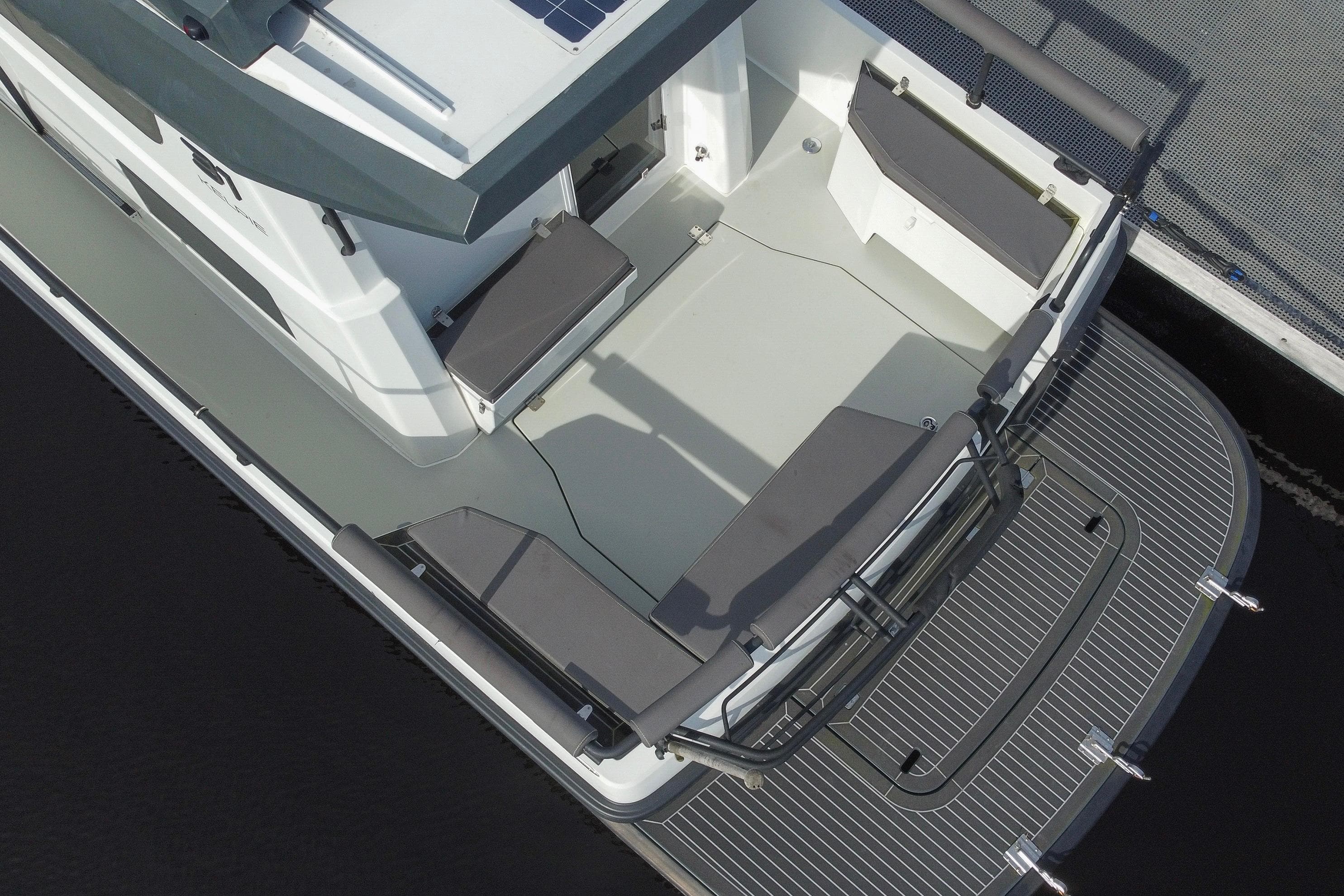 Aerial view of 2020 Sargo 31 Explorer boat deck with seating and railing.