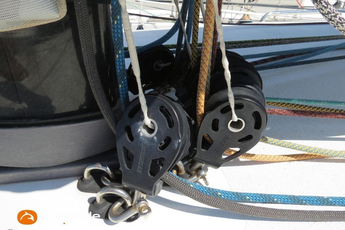 Sailing rigging on a 2015 Pogo 1250 yacht, featuring ropes and pulleys.
