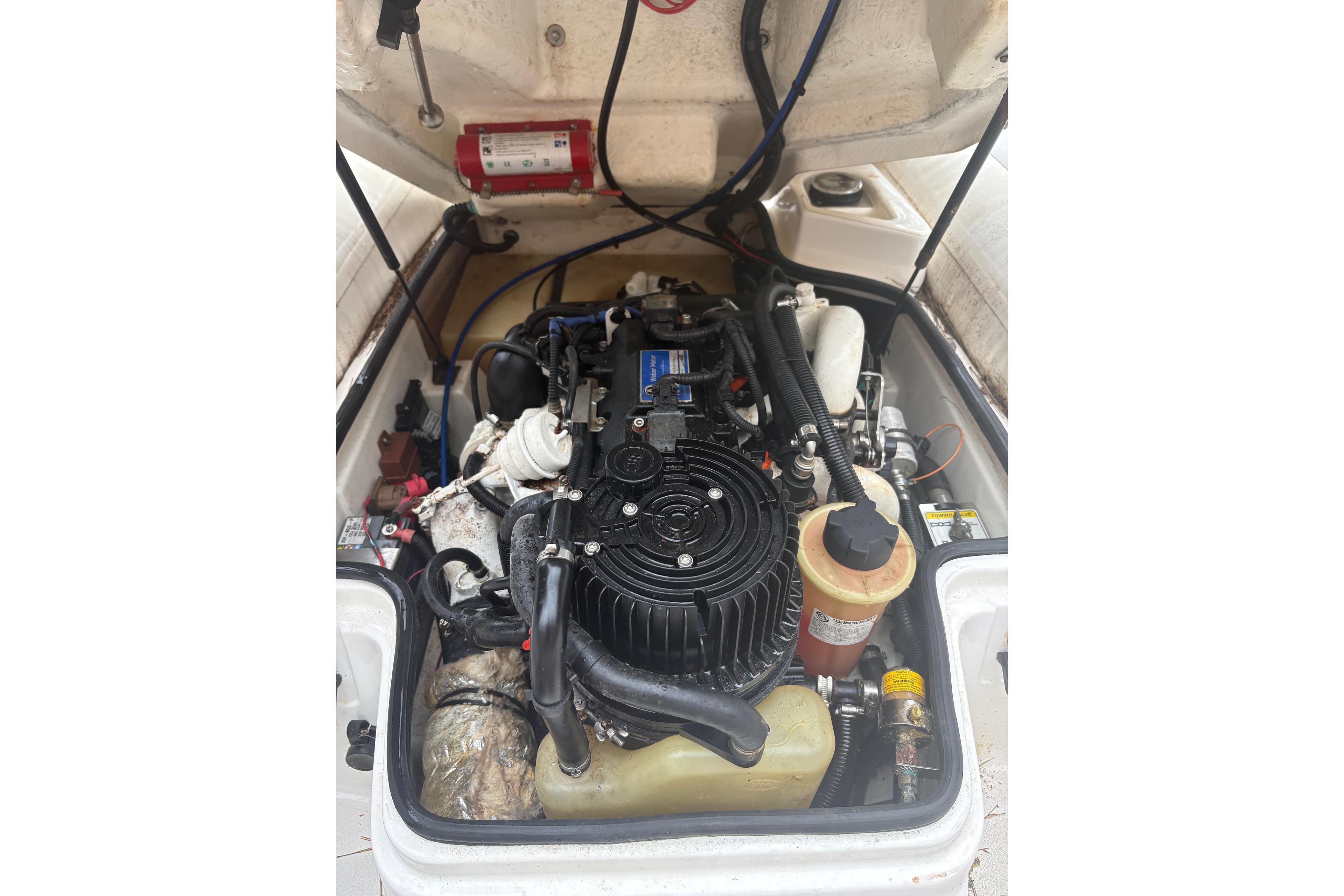 Engine compartment of a 2010 Williams Jet Tenders Turbojet 285, showcasing mechanical components.