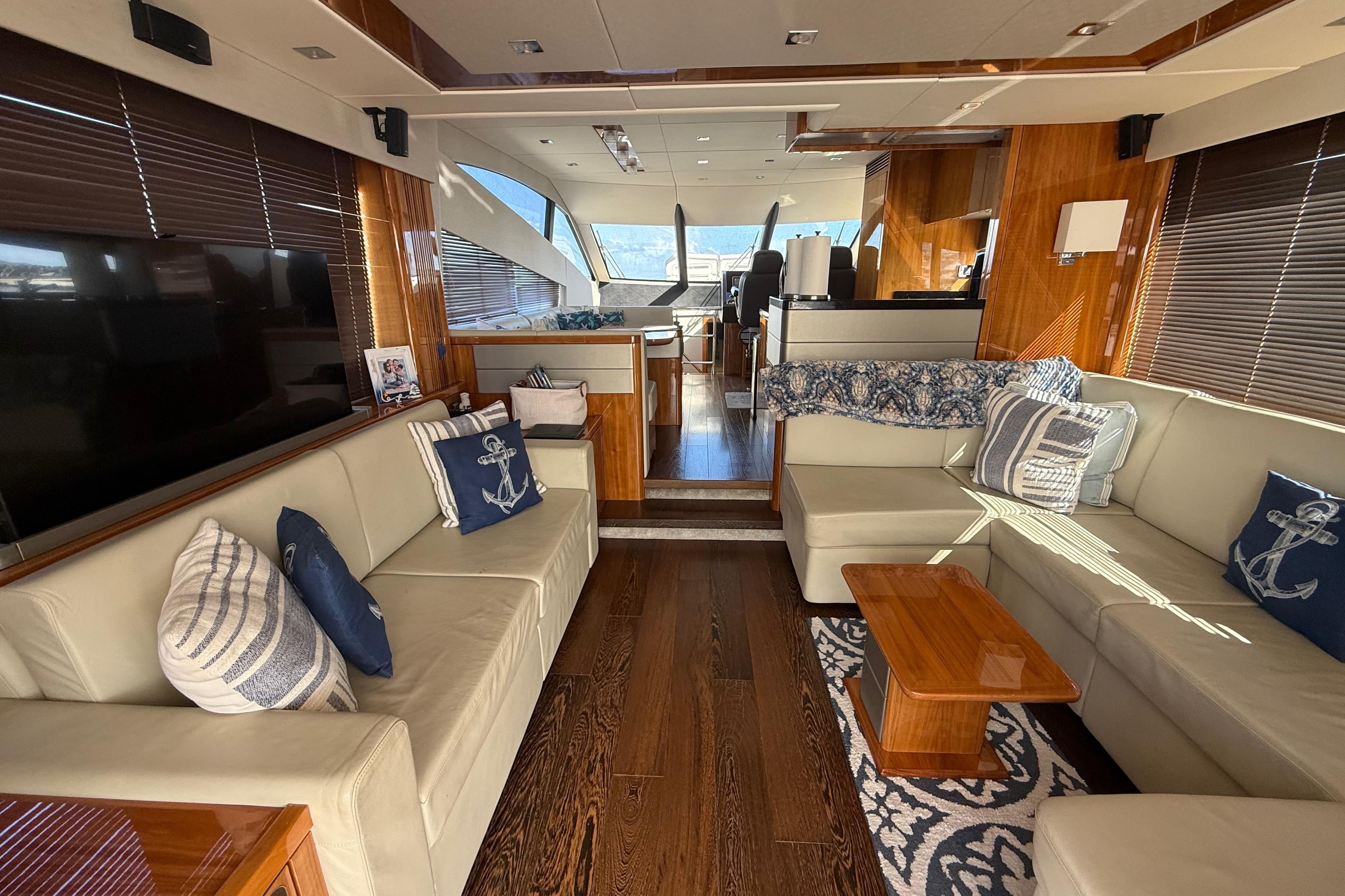 Luxurious interior of 2017 Sunseeker Manhattan 65 yacht with elegant seating and decor.