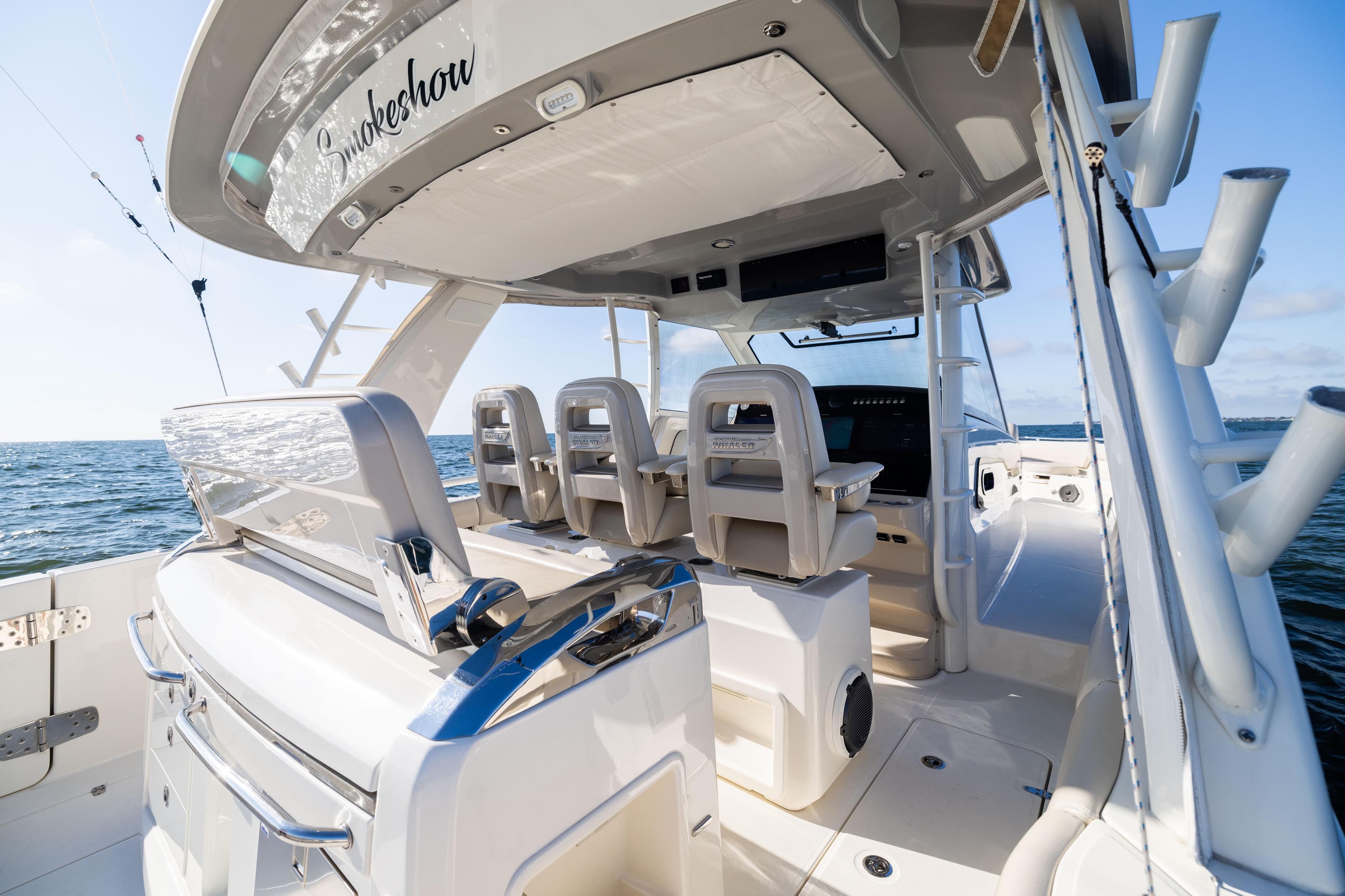 2021 Boston Whaler 420 Outrage boat interior, featuring luxurious seating and ocean view.