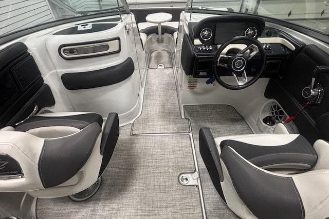 Interior of a 2019 Crownline Eclipse E255 SURF boat with modern seating and dashboard.