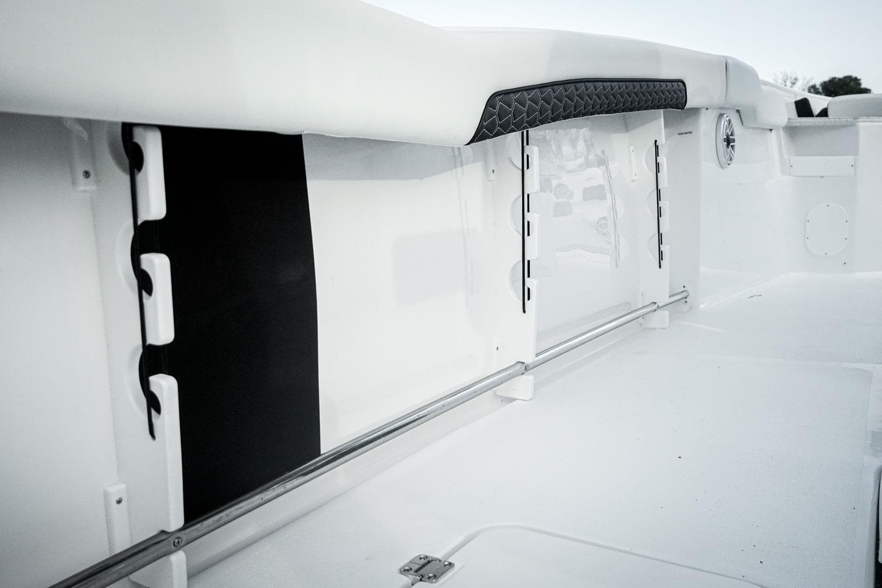 2026 Tidewater 282 CC Adventure boat interior, featuring sleek white design and modern detailing.