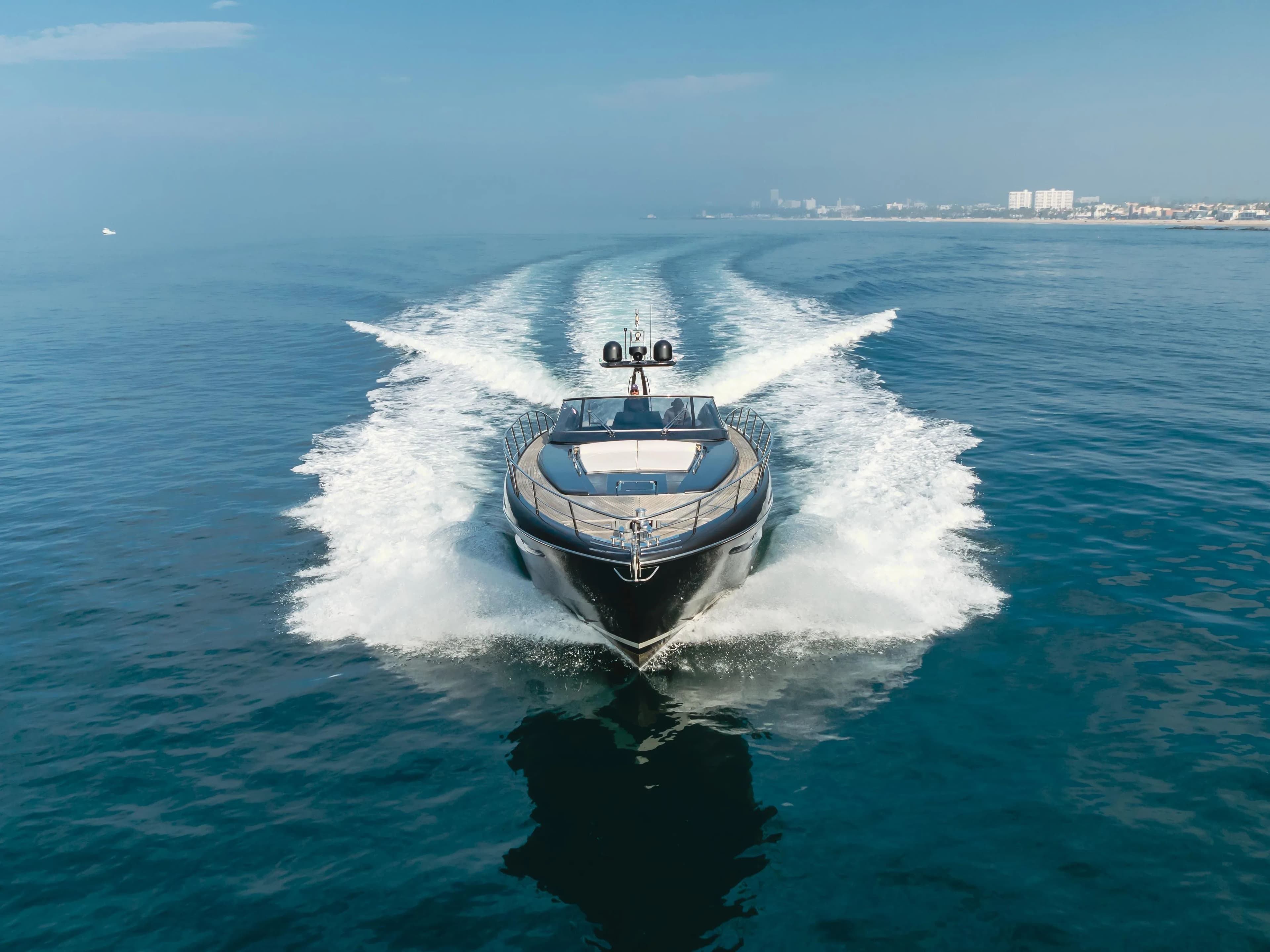 Luxury yacht Riva 63 Virtus 2016 cruising on open sea.
