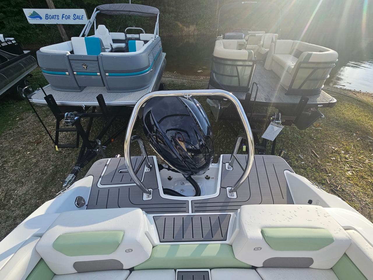 2025 Hurricane SD2050-OB boat on display, surrounded by other boats for sale.