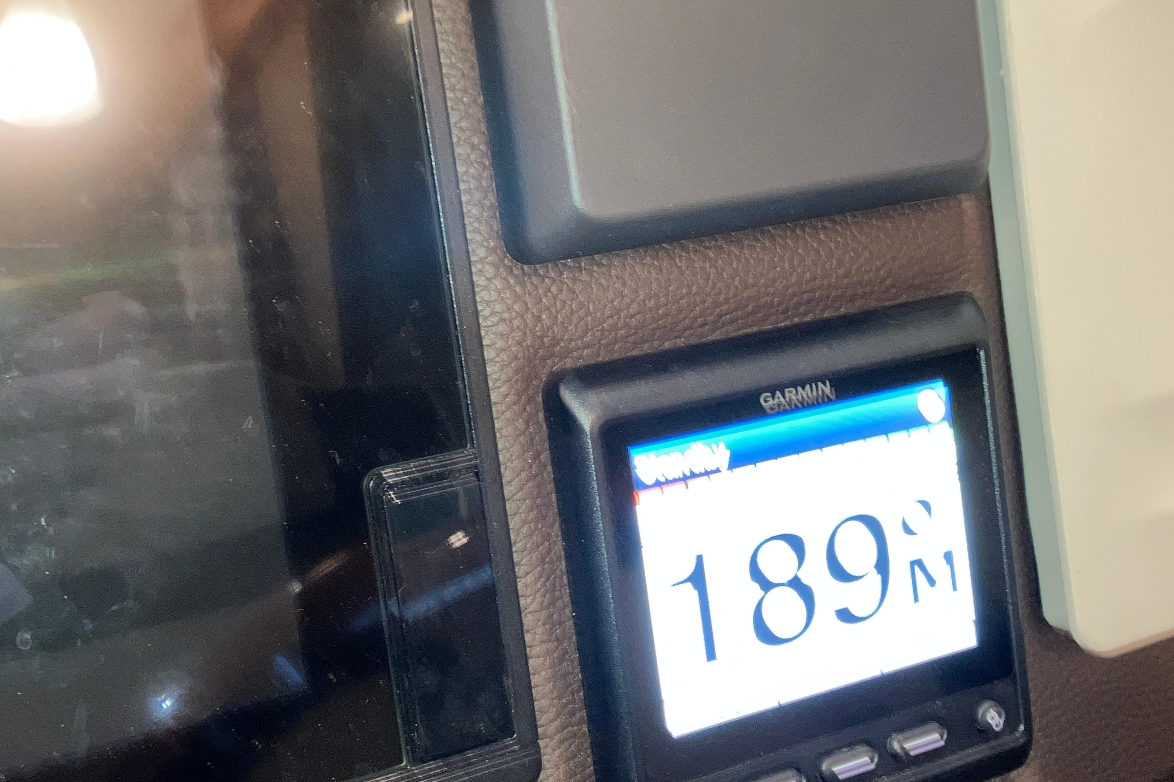 Garmin display showing 189 on 2017 Cutwater C-30 Sedan dashboard.