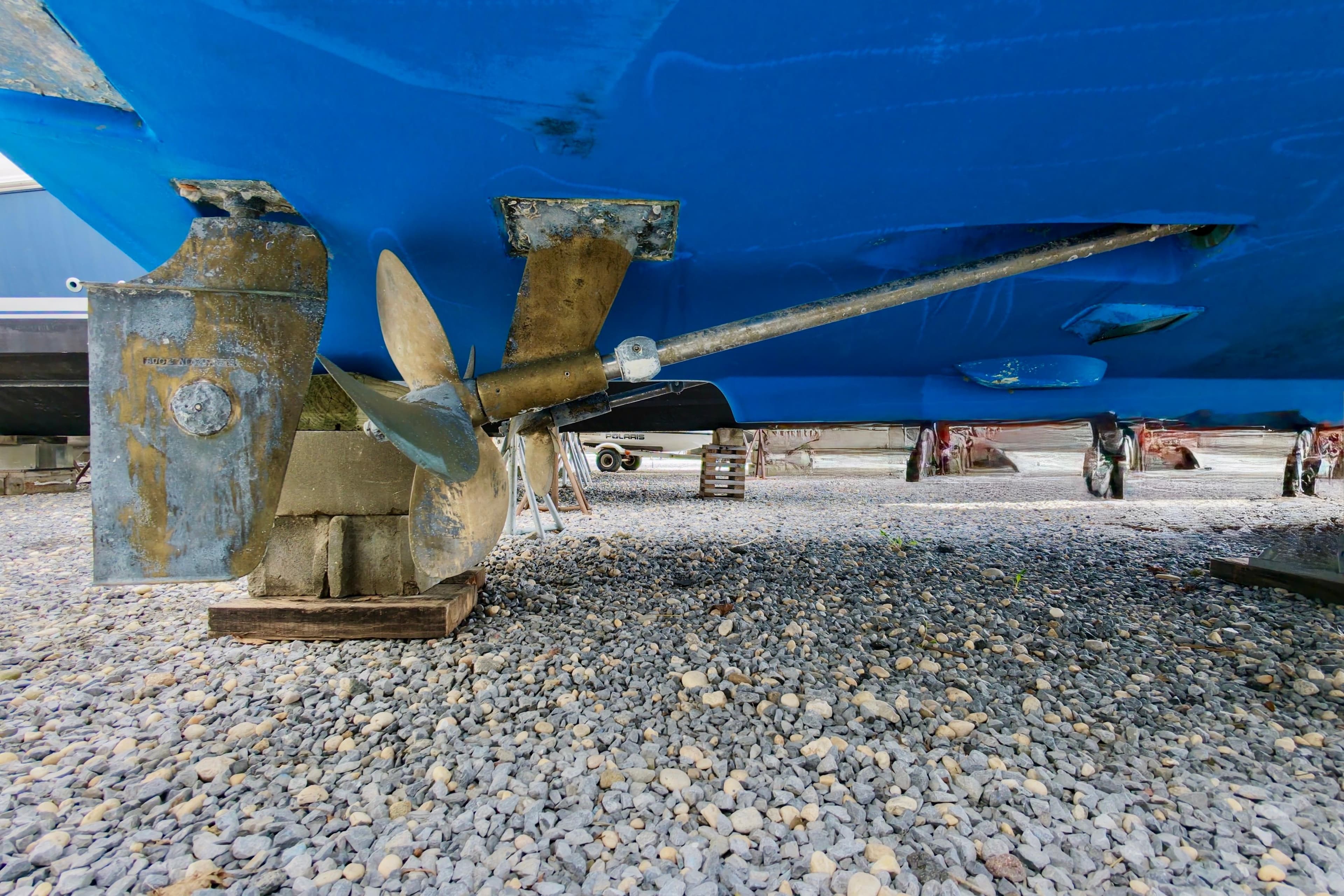 Propeller and rudder of a 2004 Topaz 32 Express.